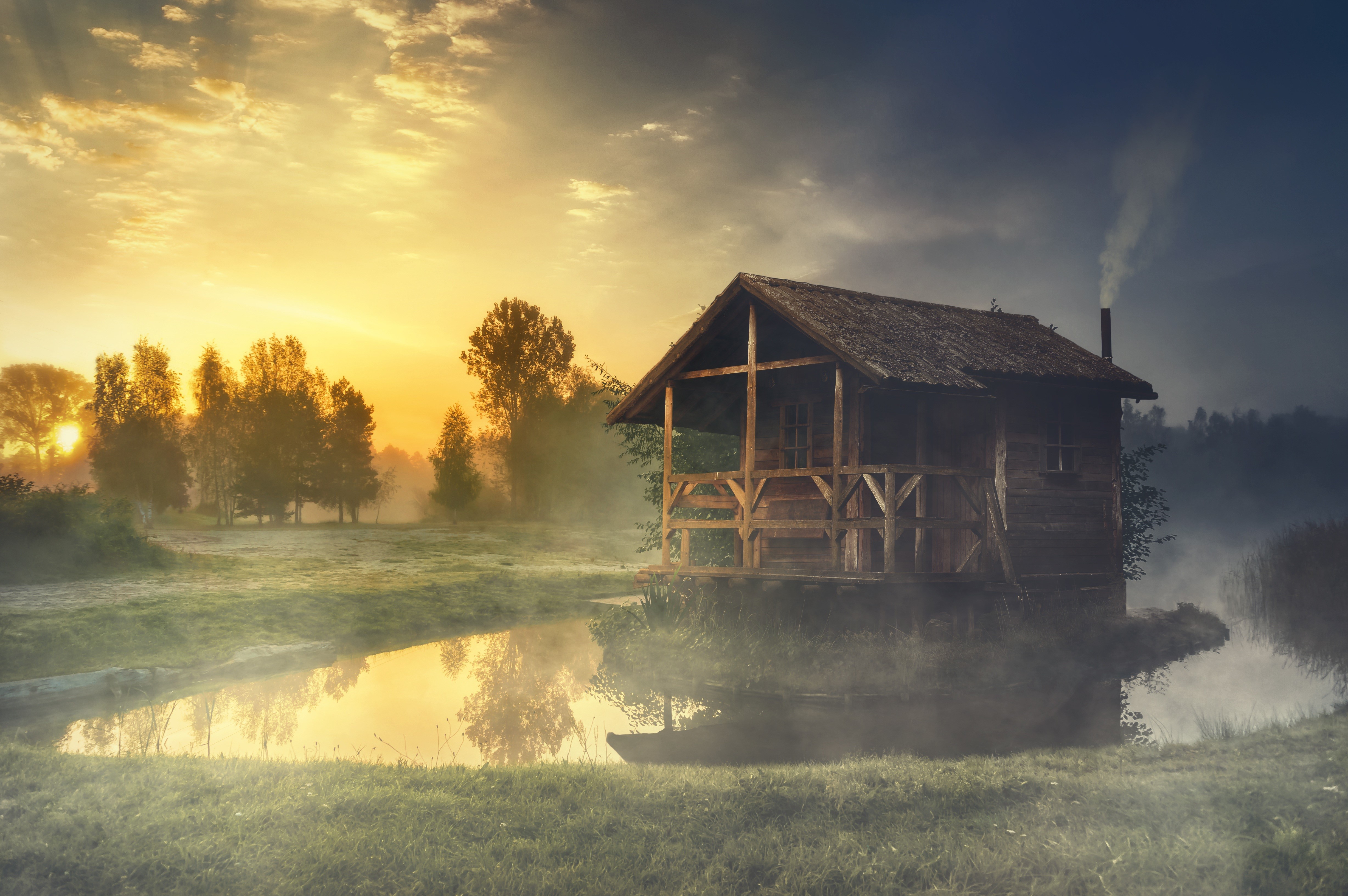 Wooden house by a foggy lake at sunrise HD Wallpaper