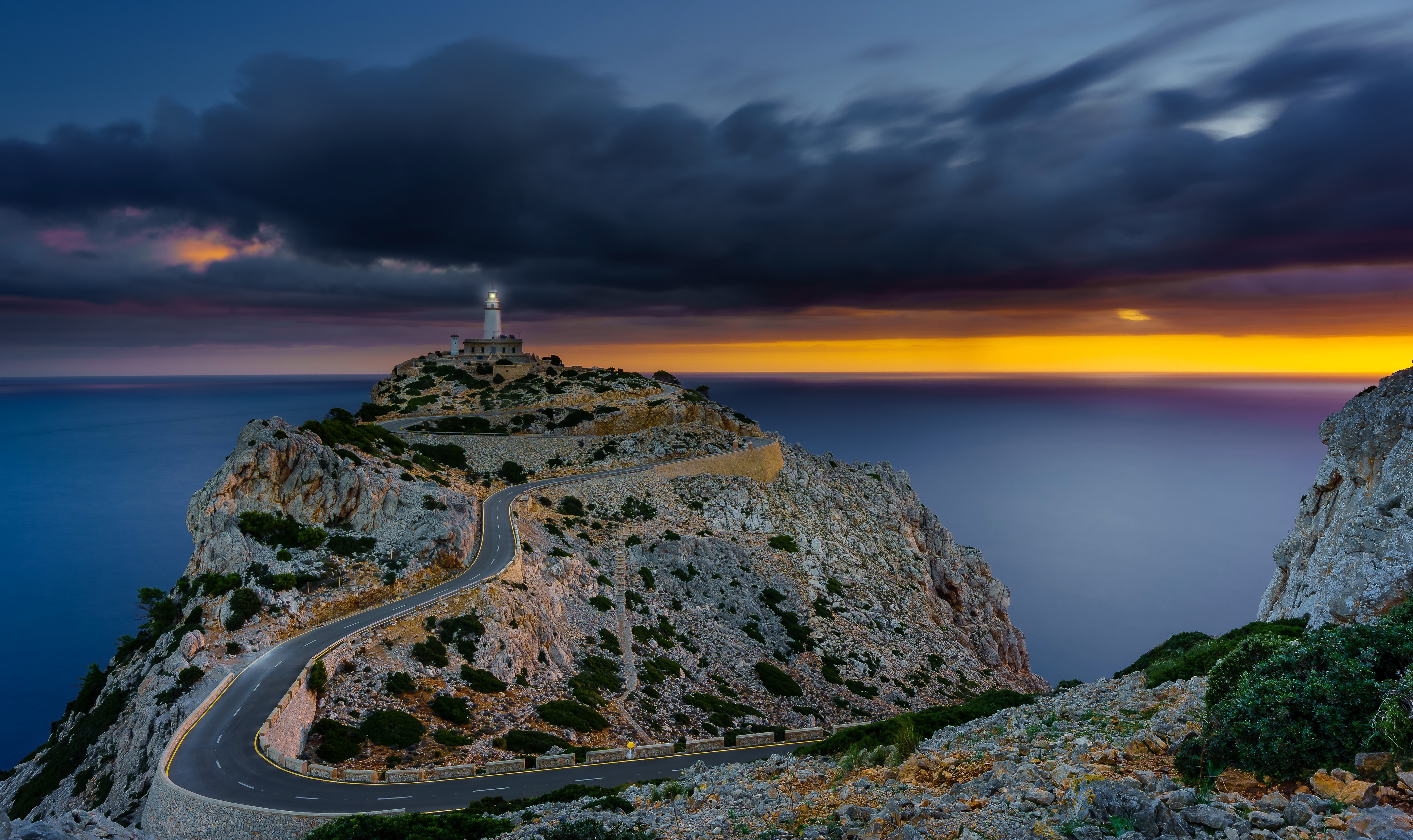 4K Lighthouse on Majorca Coast at Sunset HD Wallpaper