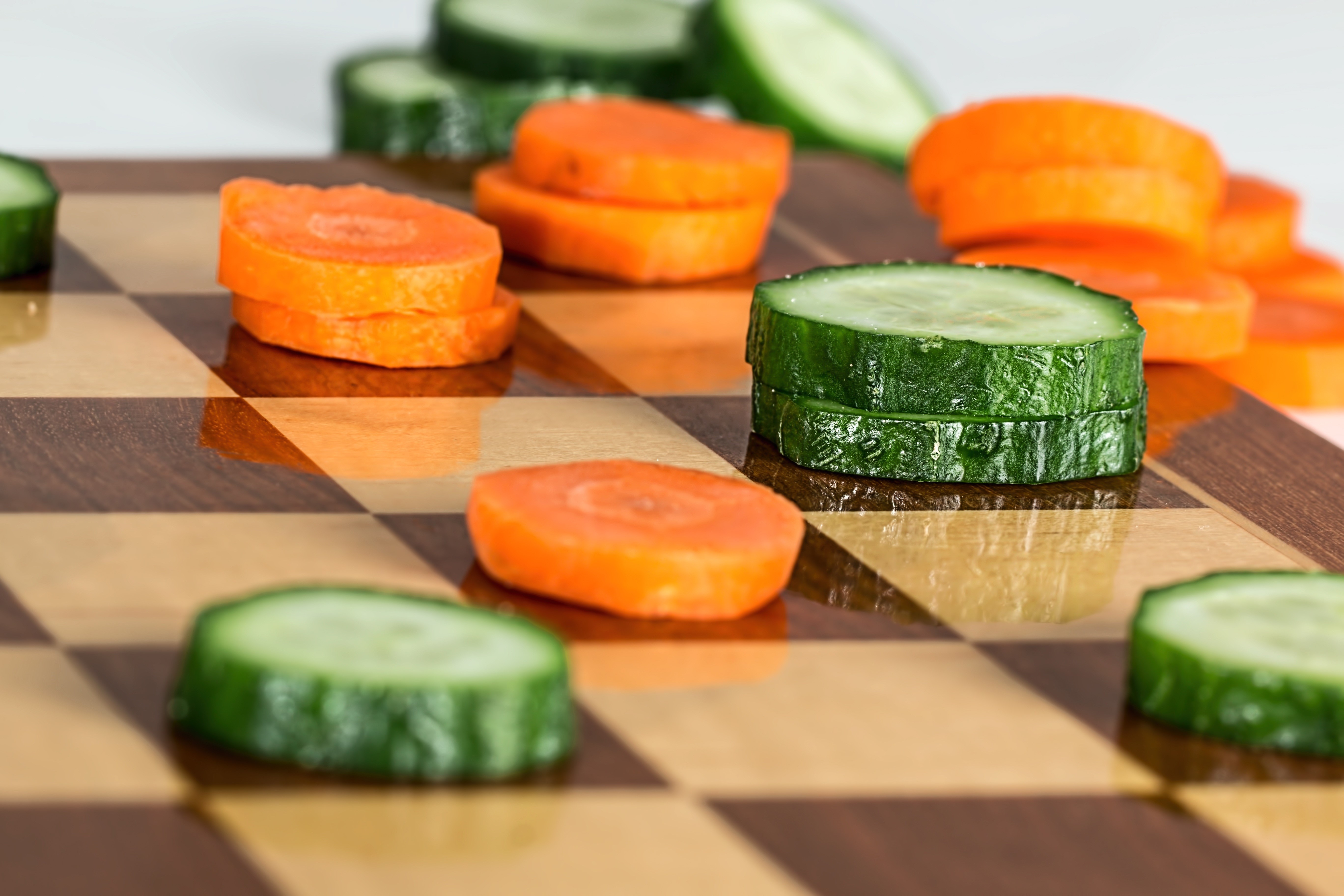 Chessboard with Sliced Carrots and Cucumbers HD Wallpaper