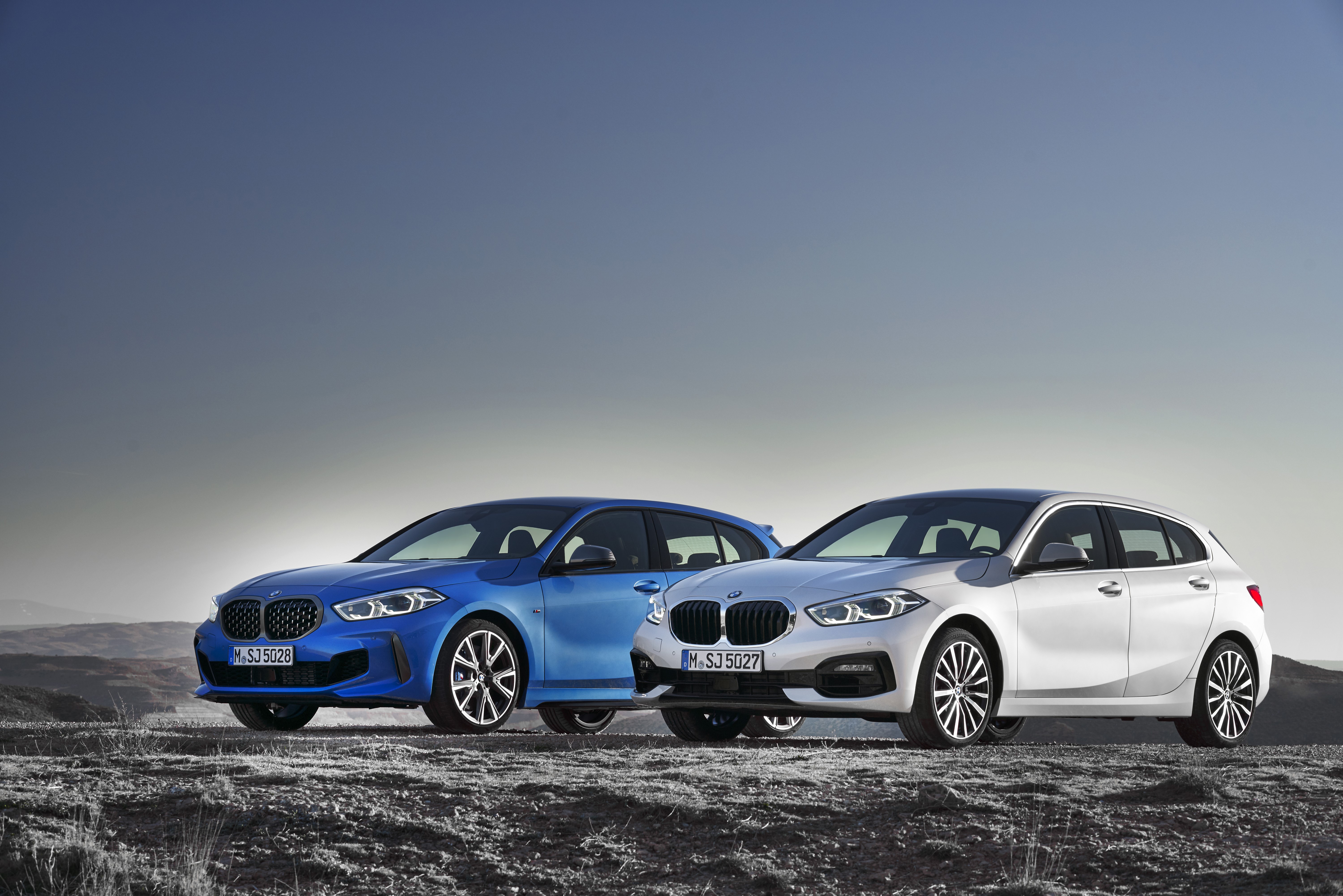 Two BMW 1 Series cars HD Wallpaper