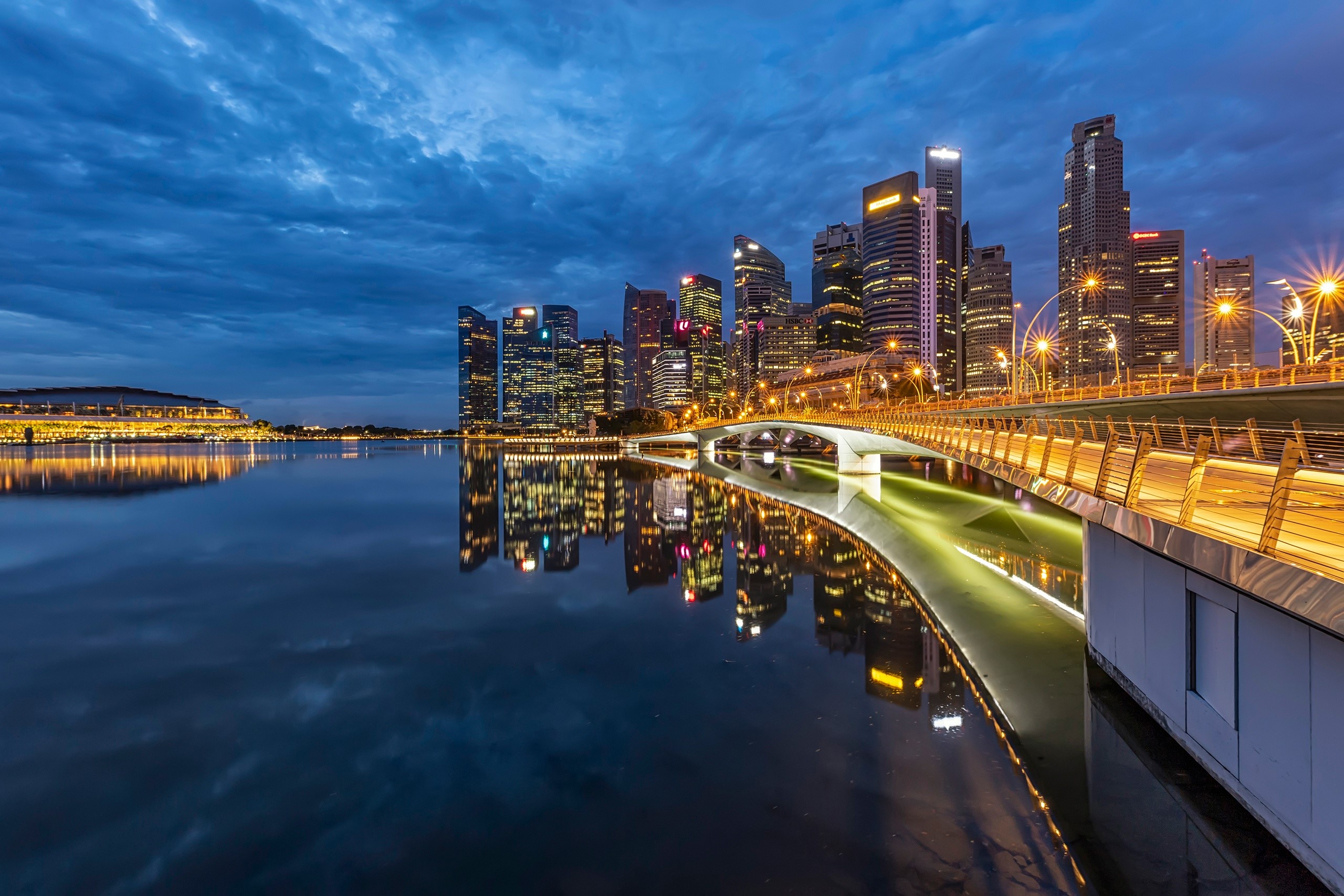 Singapore skyline and bridge at dusk with reflections HD Wallpaper