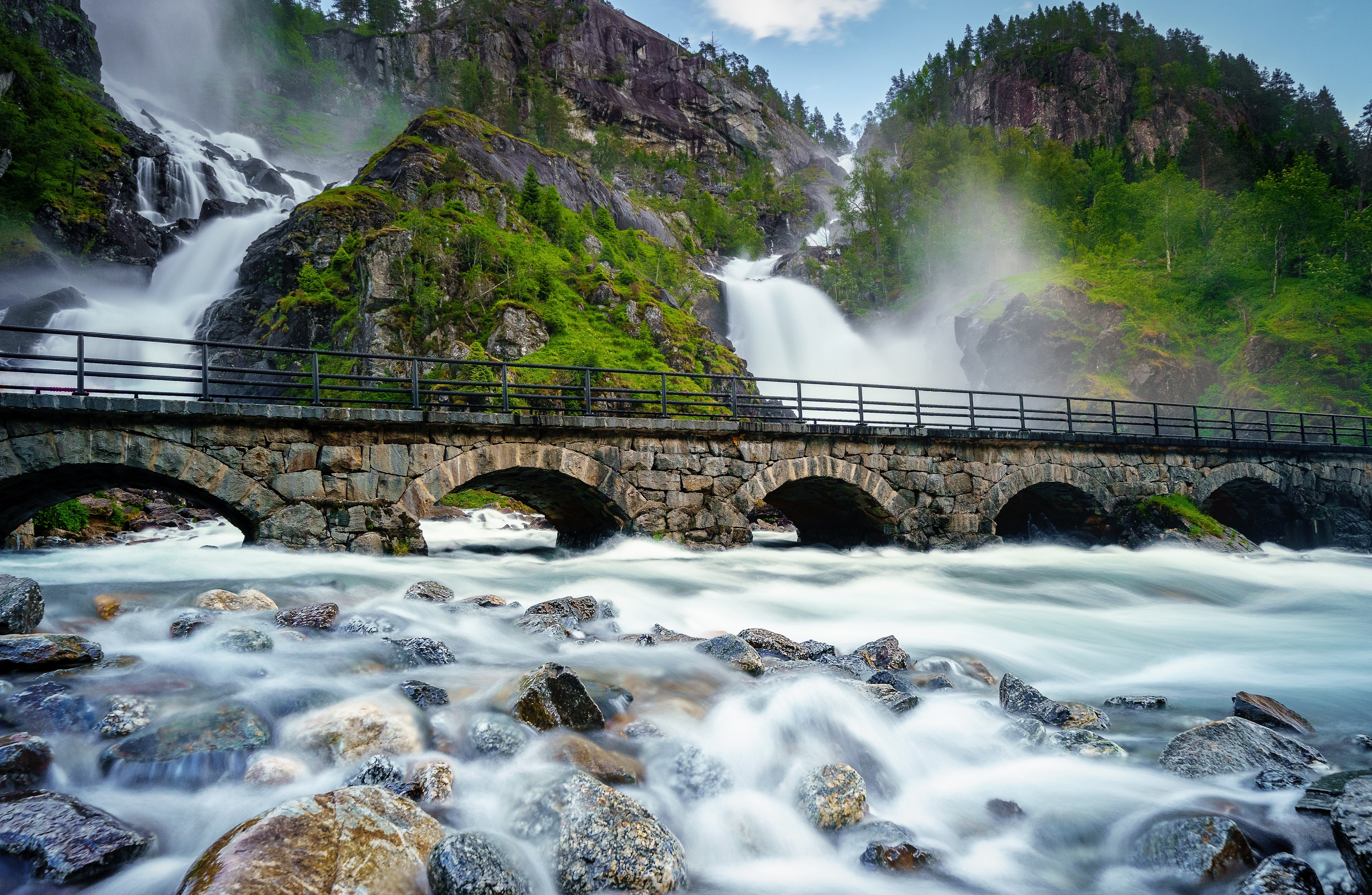 Stone bridge over a river with waterfalls in Norway HD Wallpaper