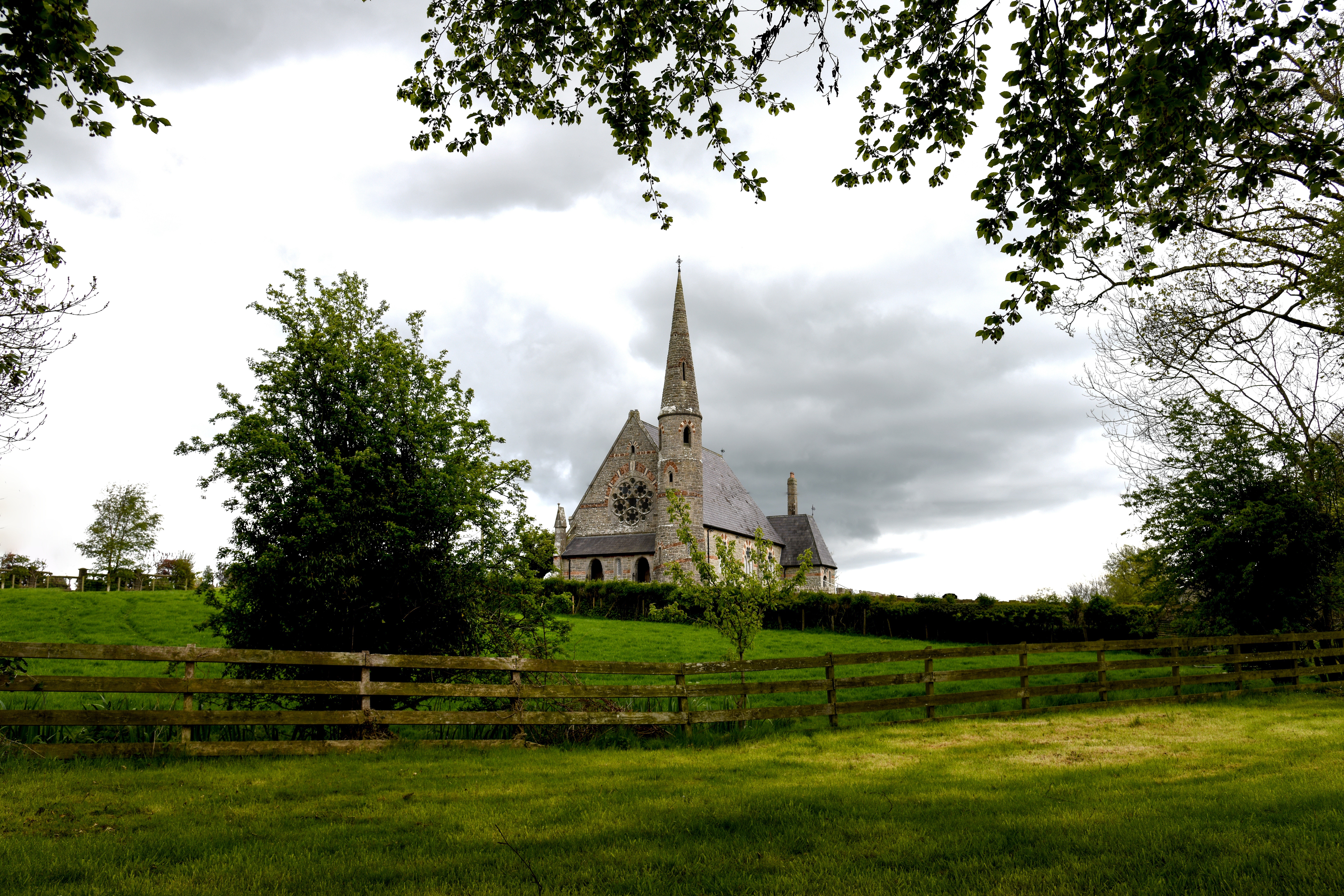 Church in Ballyclog, Ireland with fence and trees HD Wallpaper