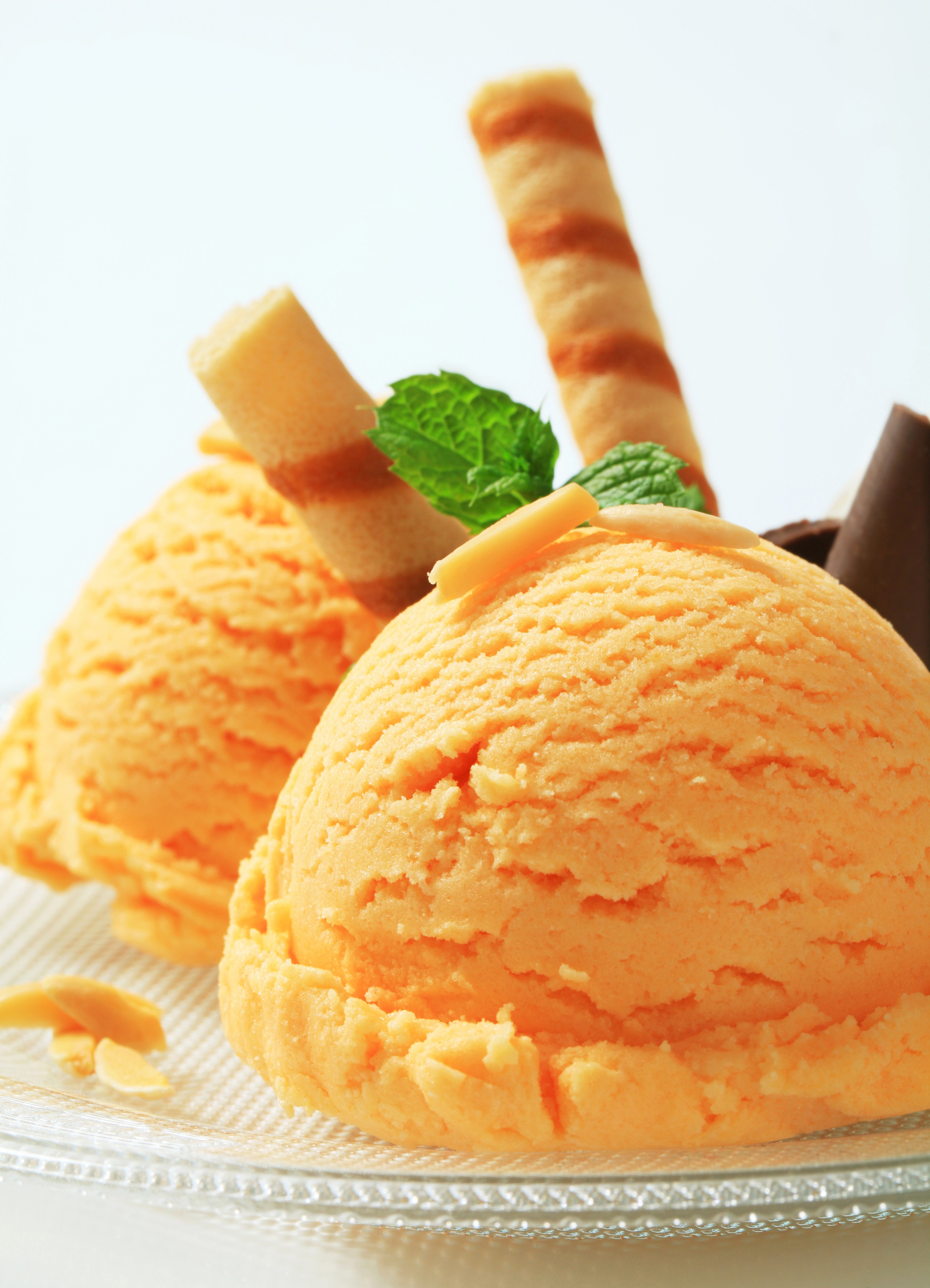 Orange ice cream scoops with wafer rolls and mint HD Phone Wallpaper
