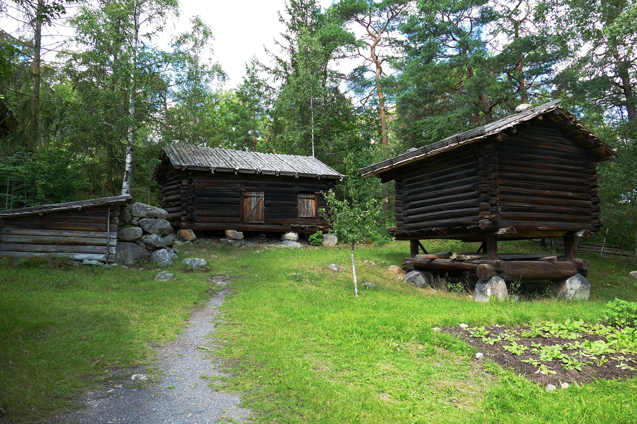 Wooden houses and a path at Skansen, Stockholm, Sweden HD Wallpaper