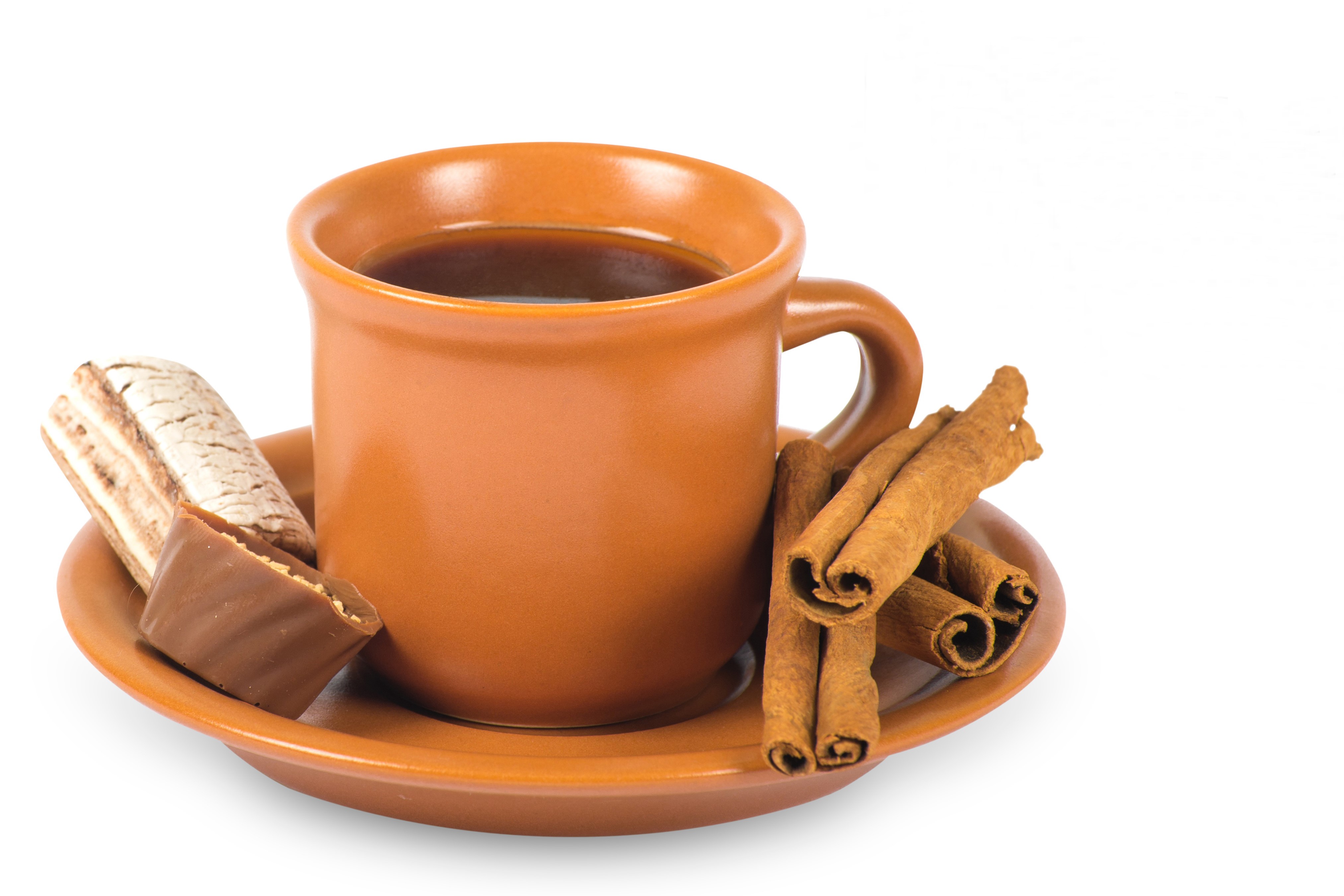 Coffee mug with cinnamon sticks and candy on a saucer HD Wallpaper