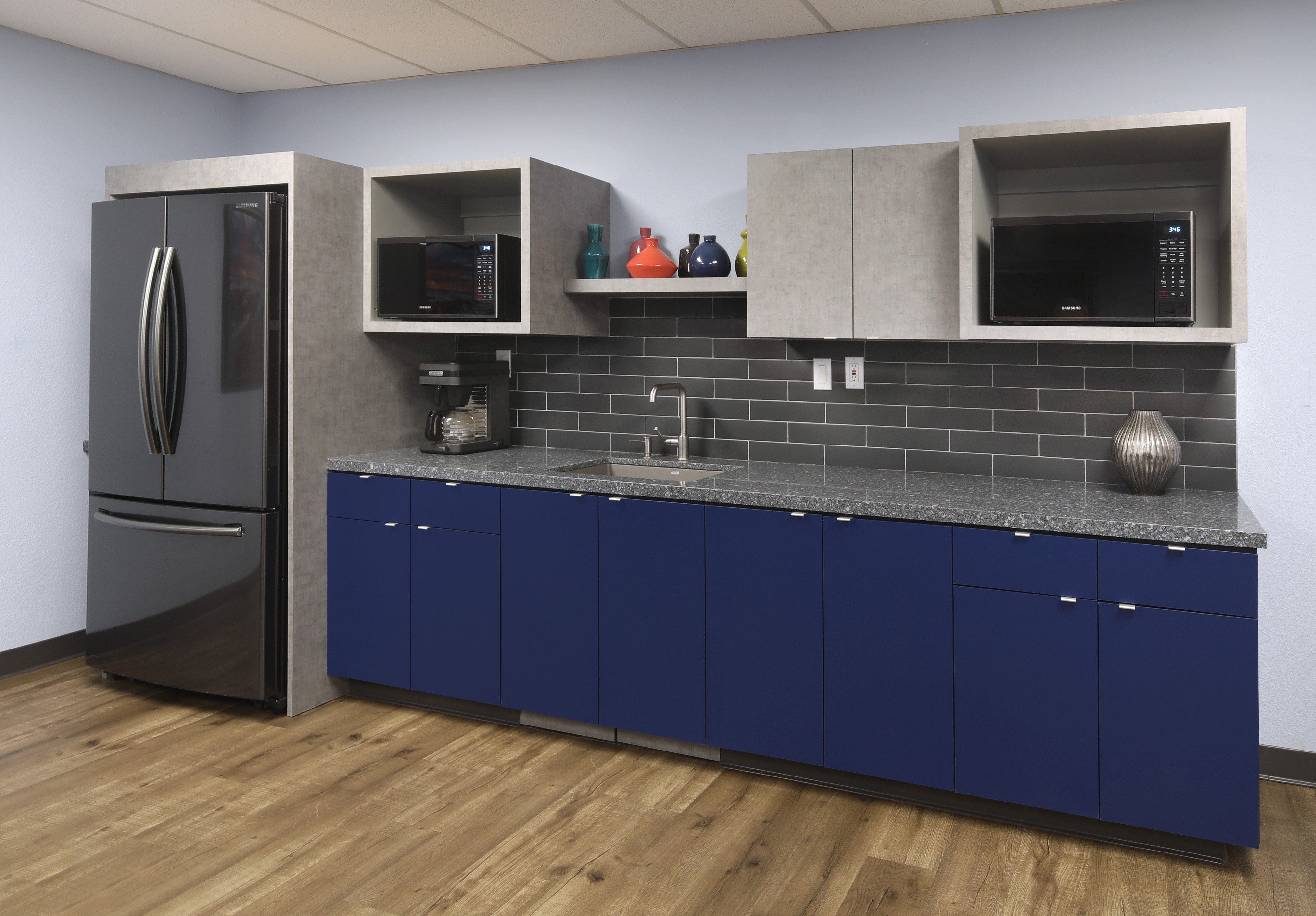 Modern Kitchenette with Refrigerator and Cabinets HD Wallpaper
