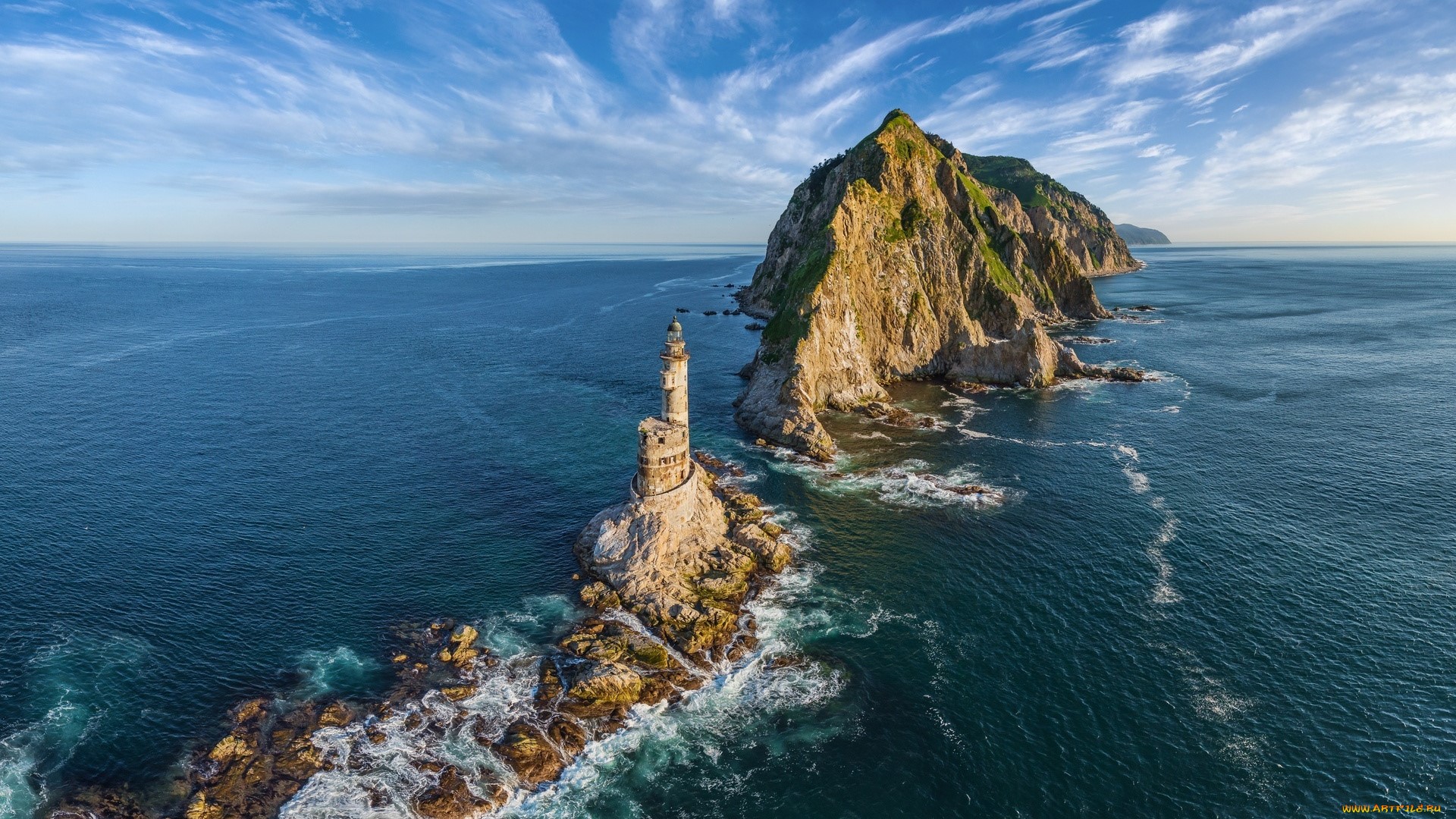 Lighthouse on a rocky island near Sakhalin, Russia HD Wallpaper