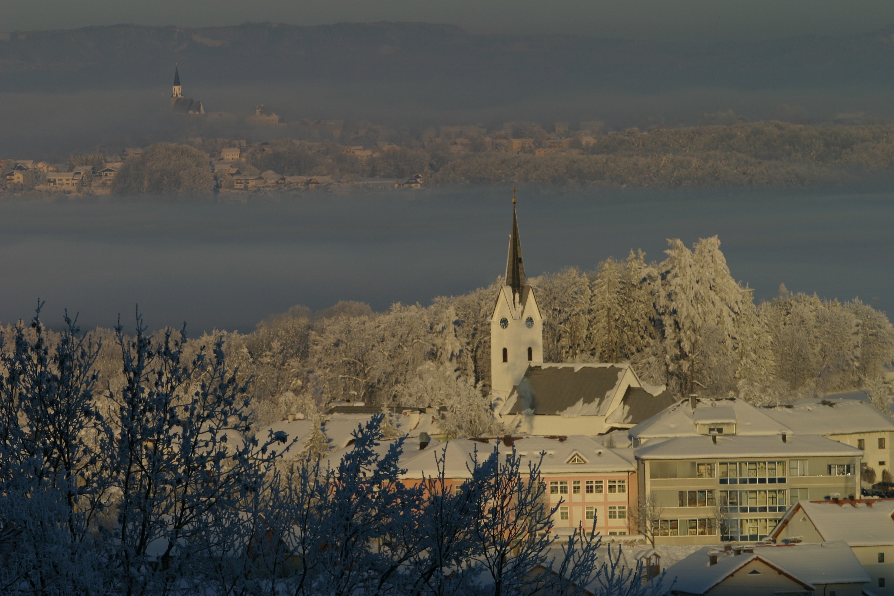 Winter scene in Gschwandt, Austria with snow and fog HD Wallpaper