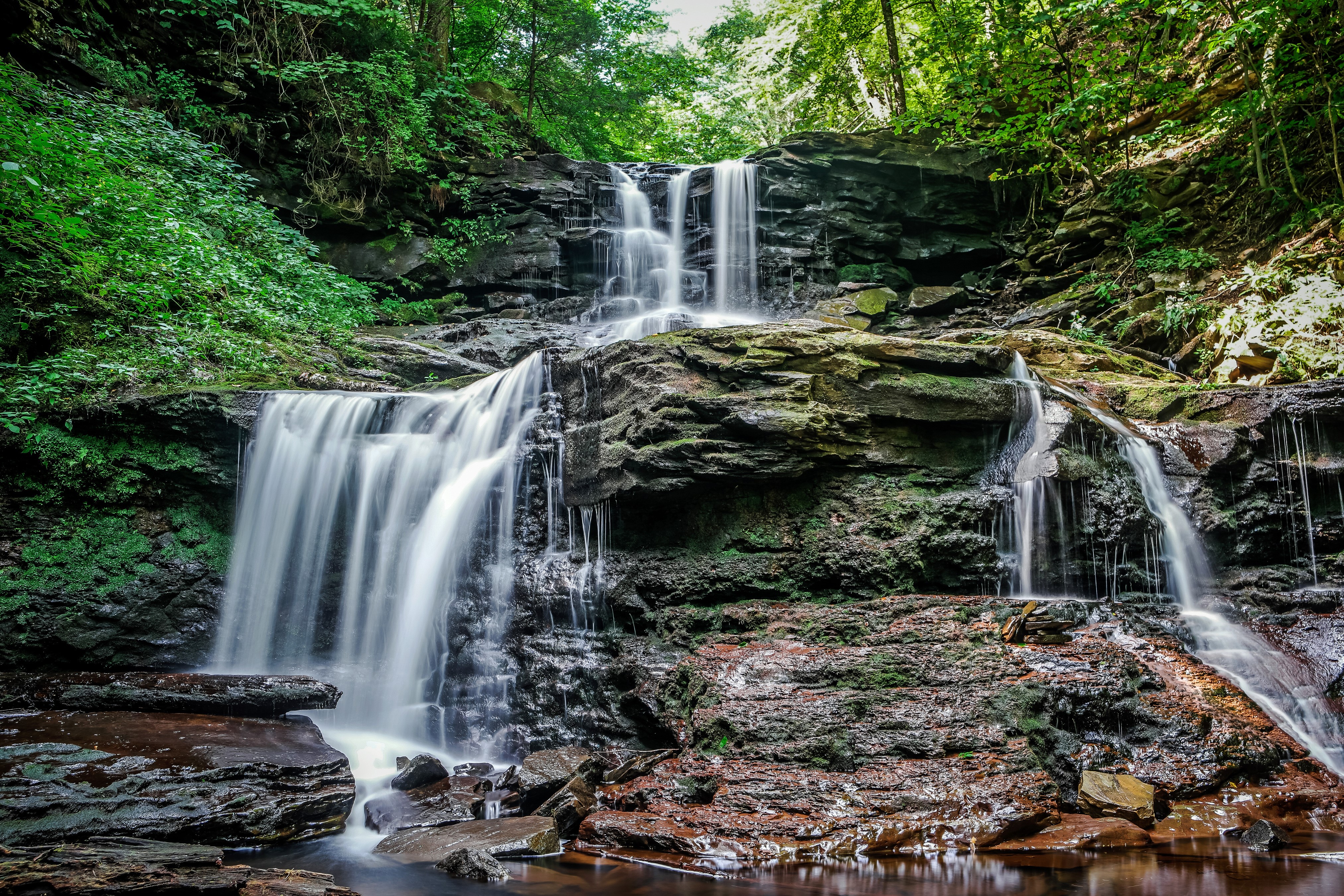 4K Waterfalls at Ricketts Glen Amid Mossy Crags HD Wallpaper