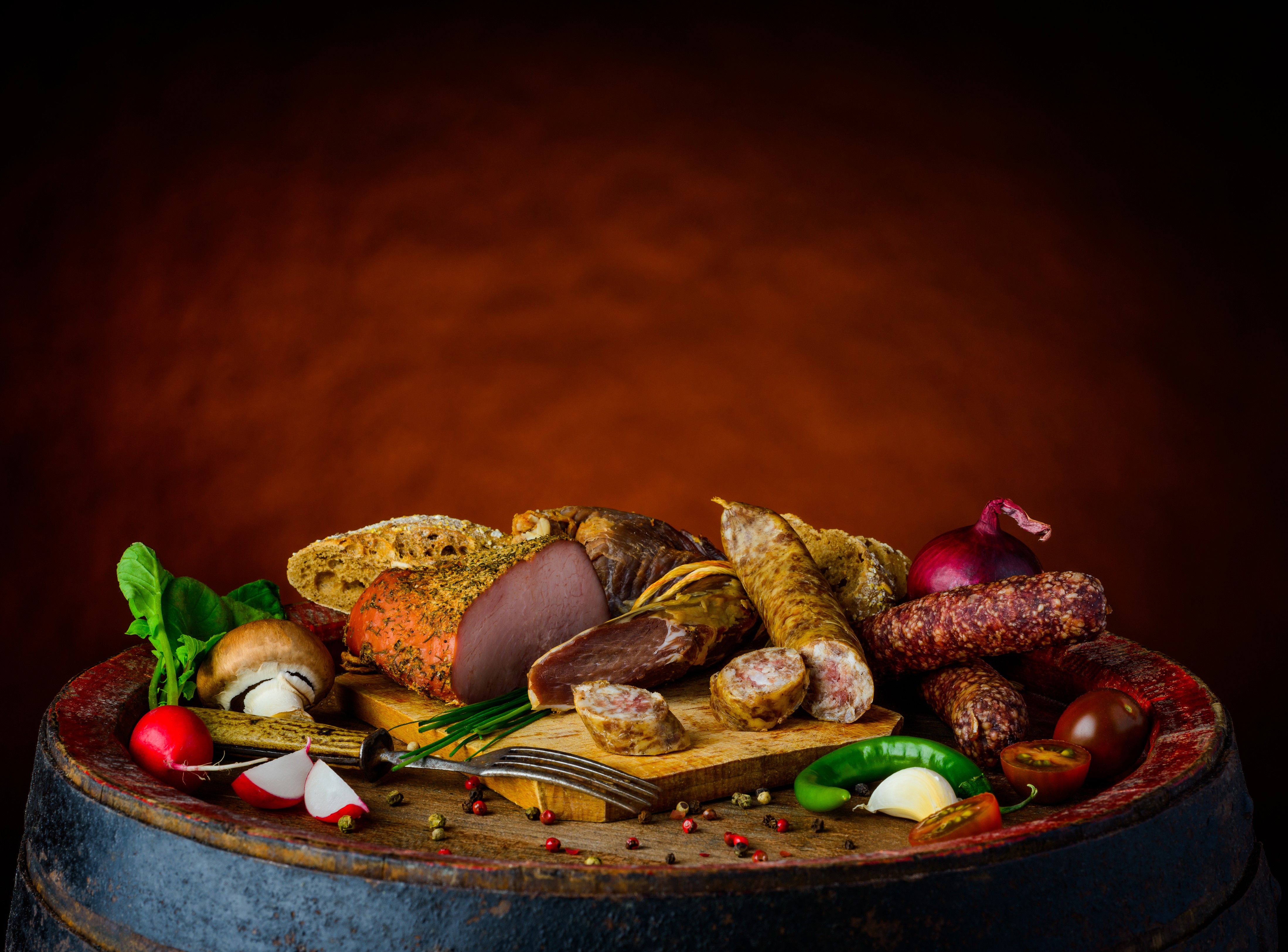 Assortment of Sausages, Meats, and Vegetables on a Barrel HD Wallpaper