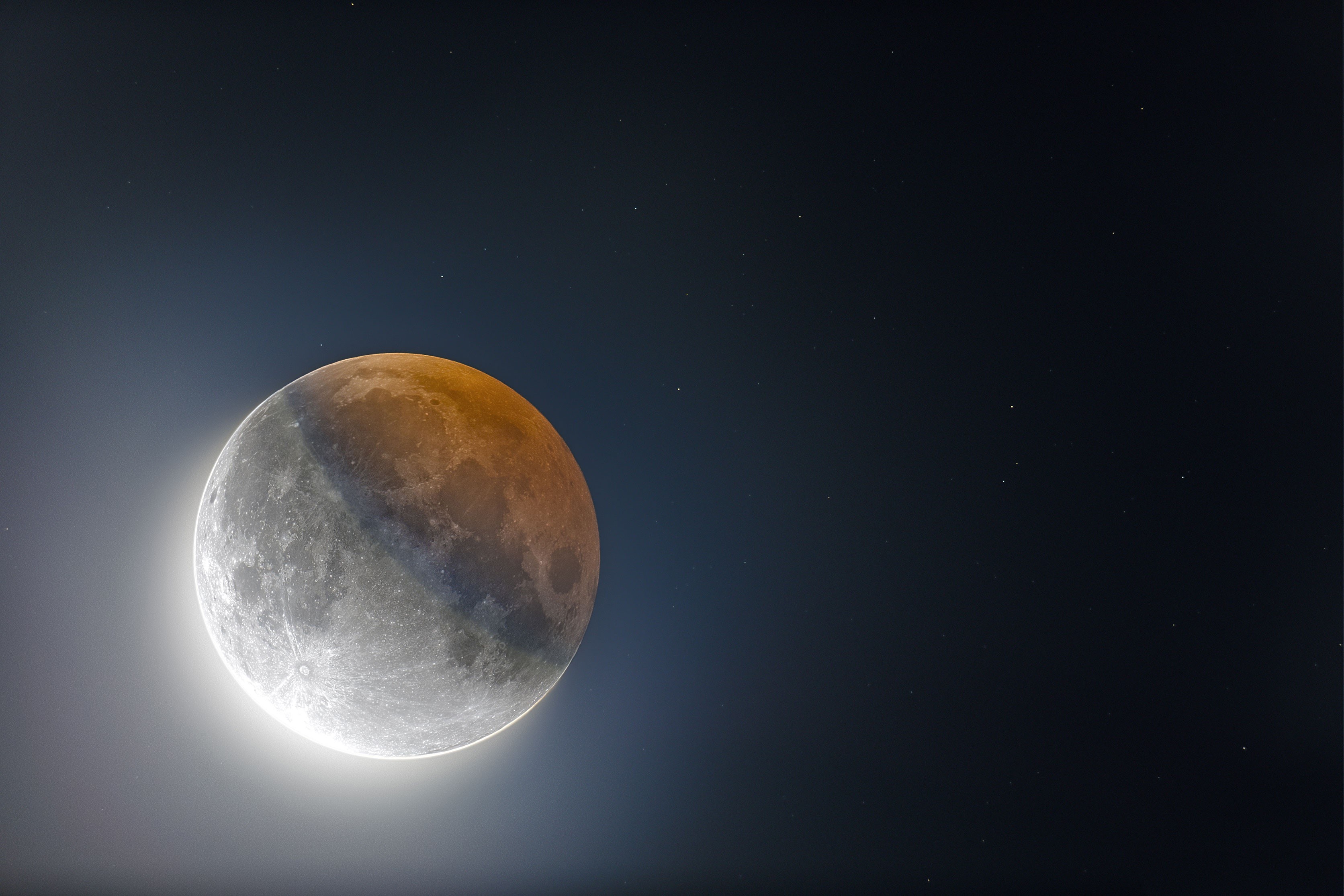 Eclipsed Moon in Starry Night Sky HD Wallpaper