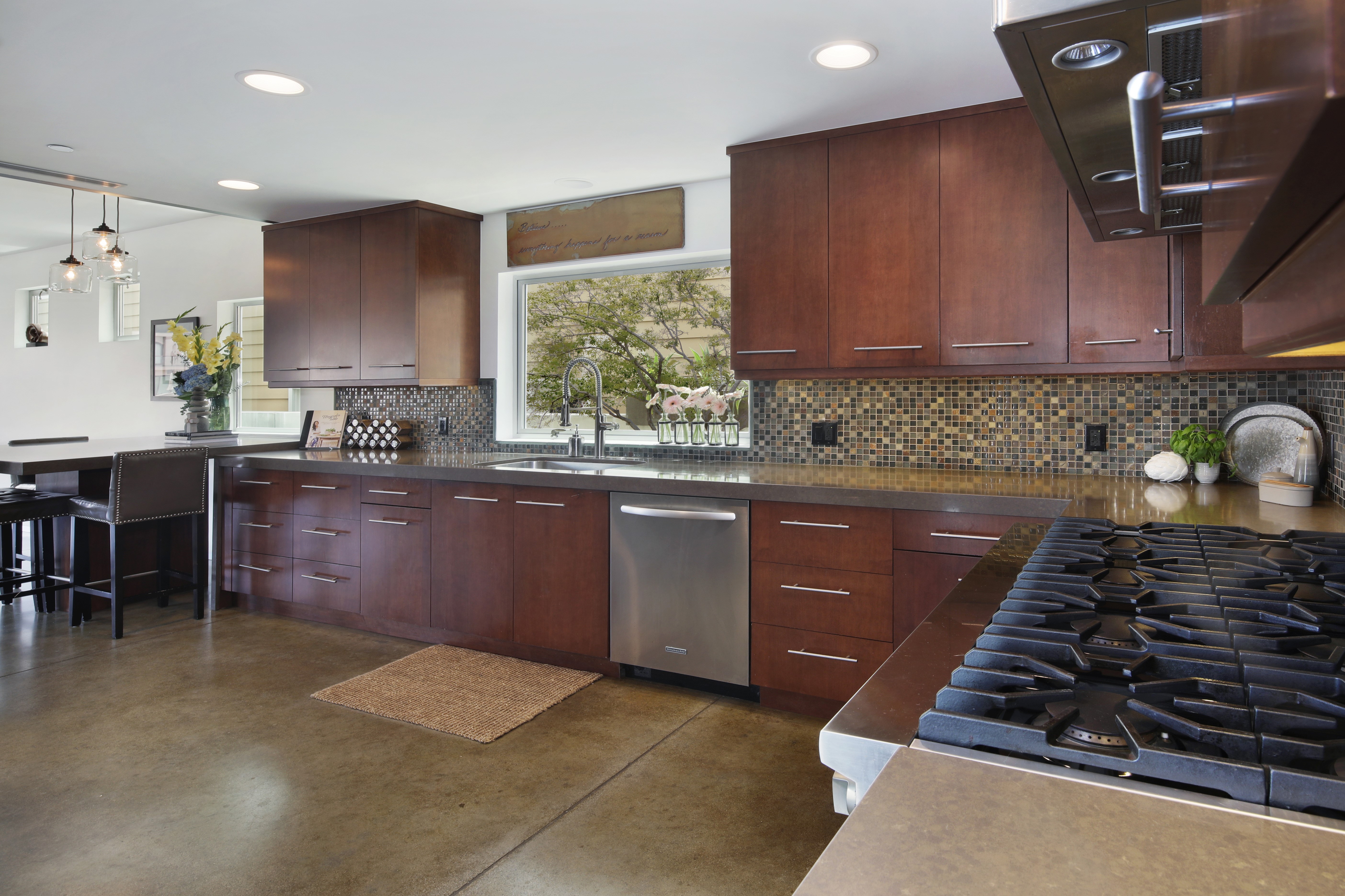 Modern Kitchen with Dark Wood Cabinets and Stainless Steel Appliances HD Wallpaper