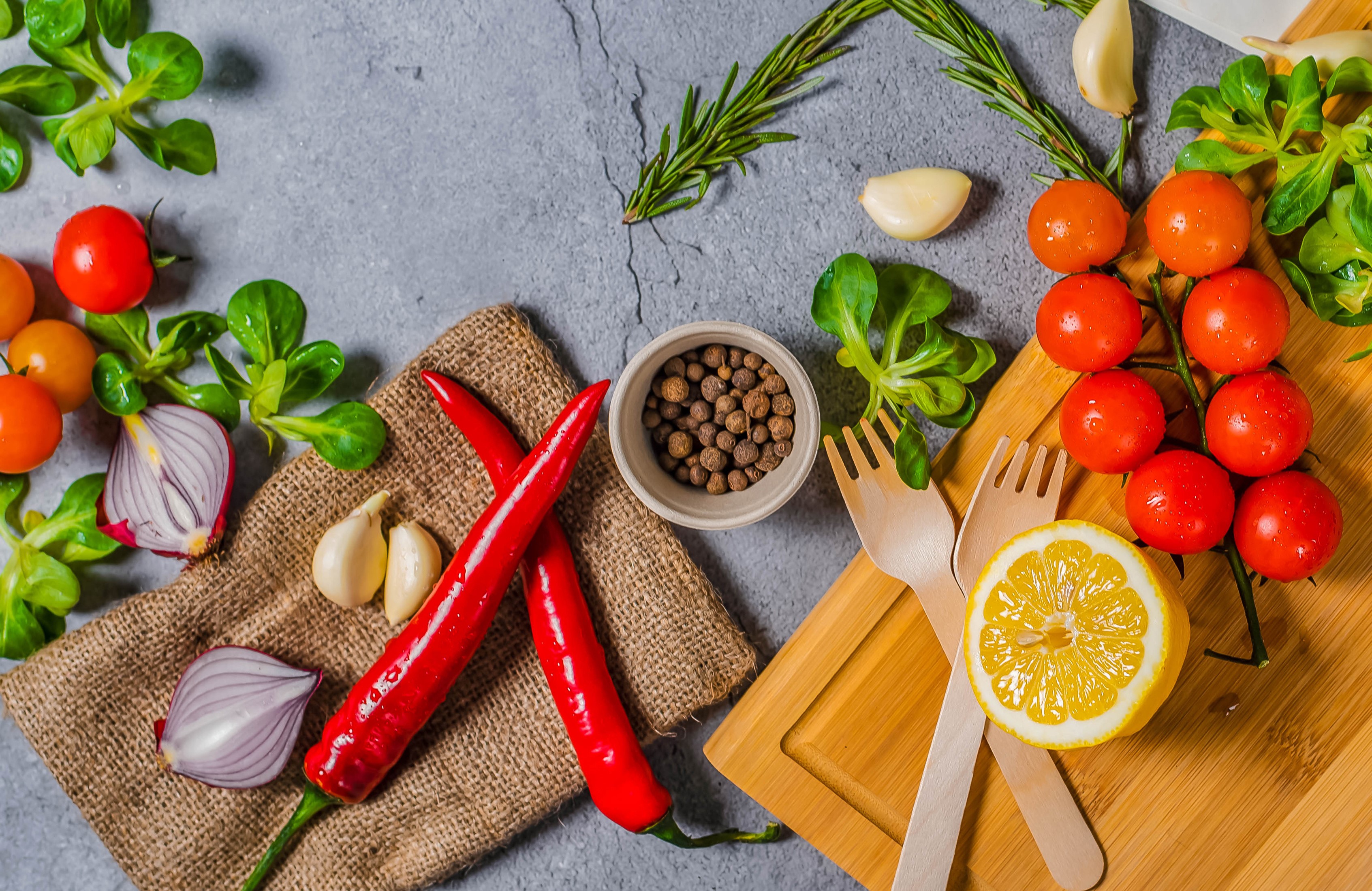 Vegetables and spices on a cutting board HD Wallpaper
