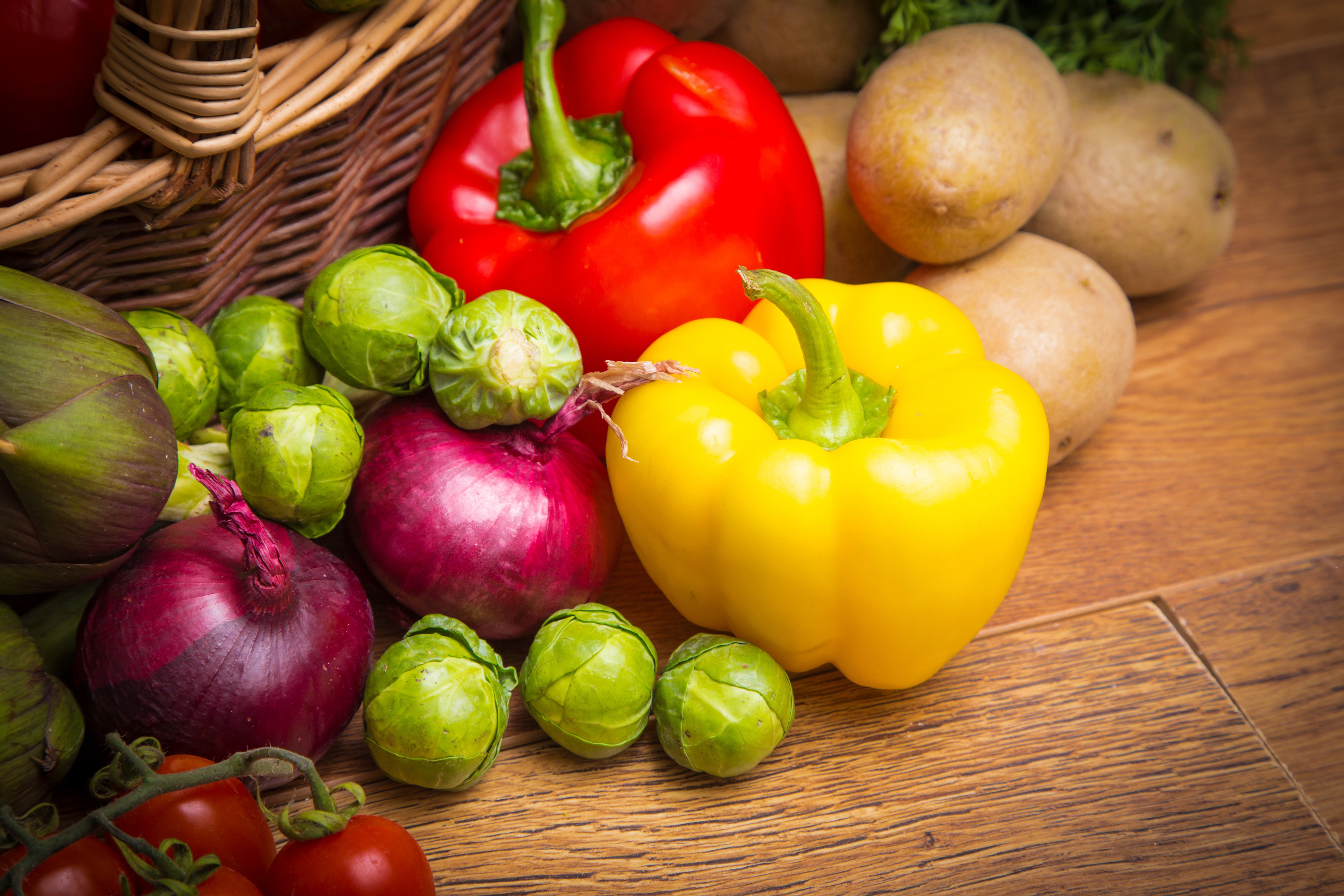 Vegetables including bell peppers, onions, potatoes, and tomatoes HD Wallpaper