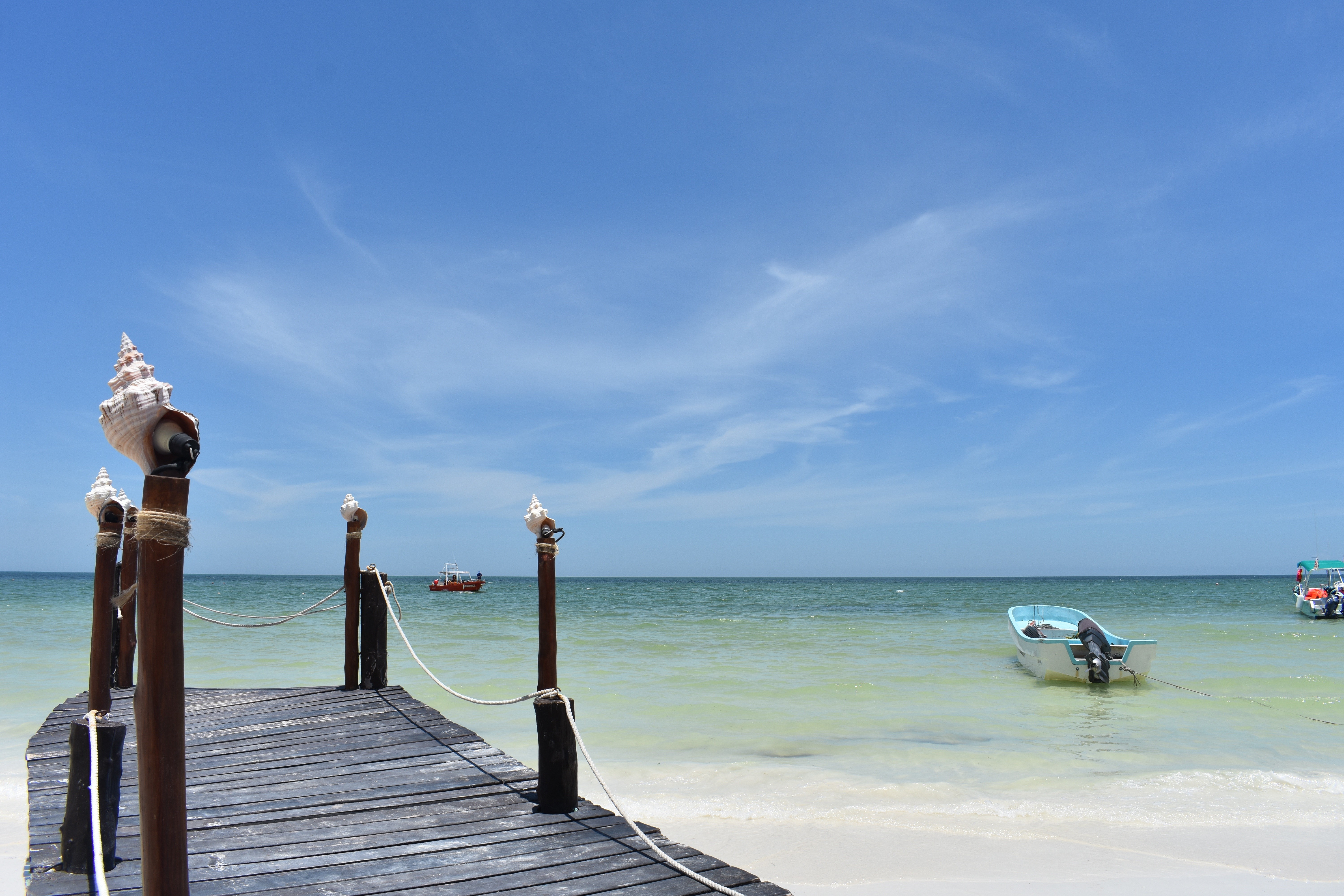 Wooden pier with shells on posts, Isla Holbox, Mexico HD Wallpaper