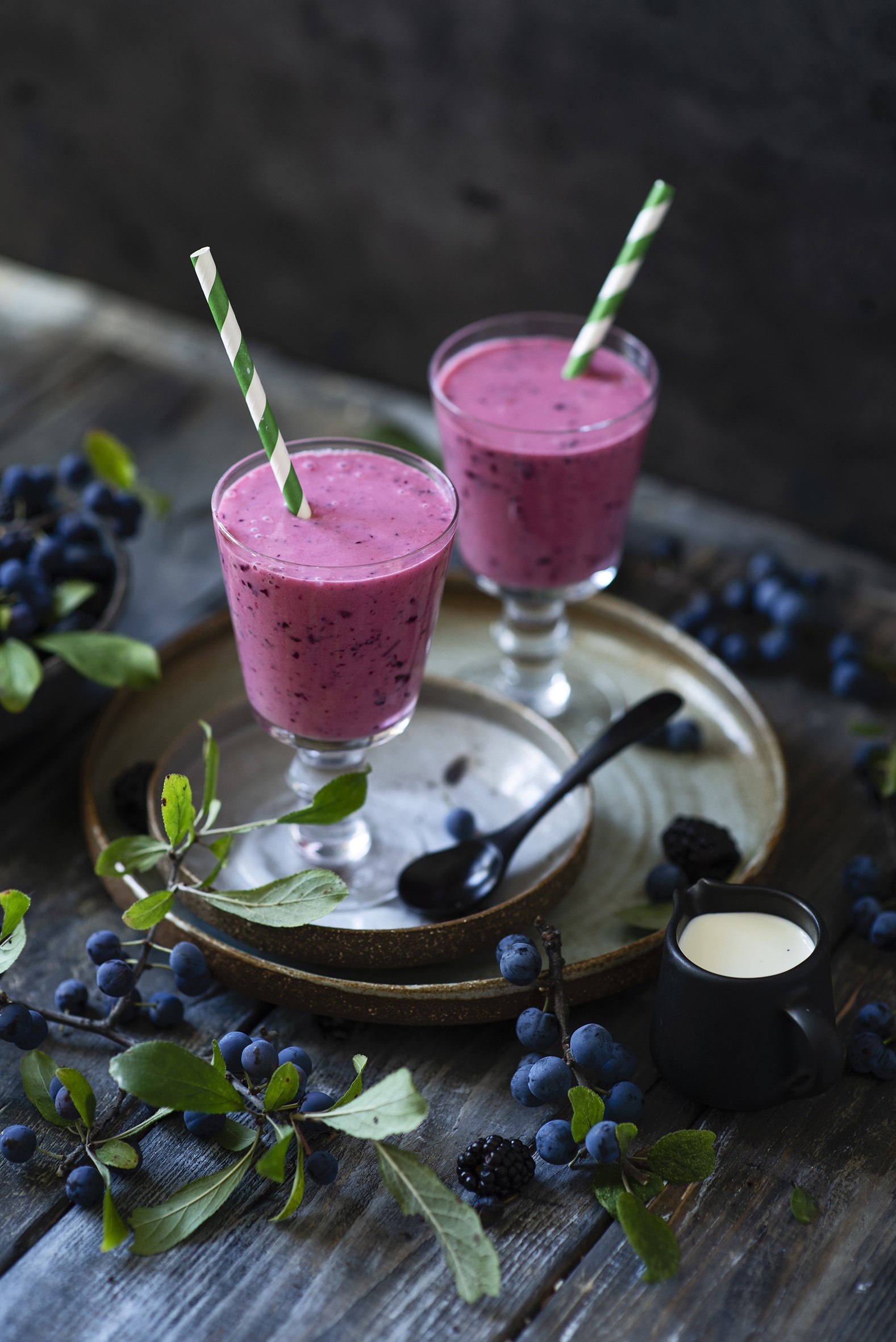 Two berry smoothies with straws and berries HD Phone Wallpaper