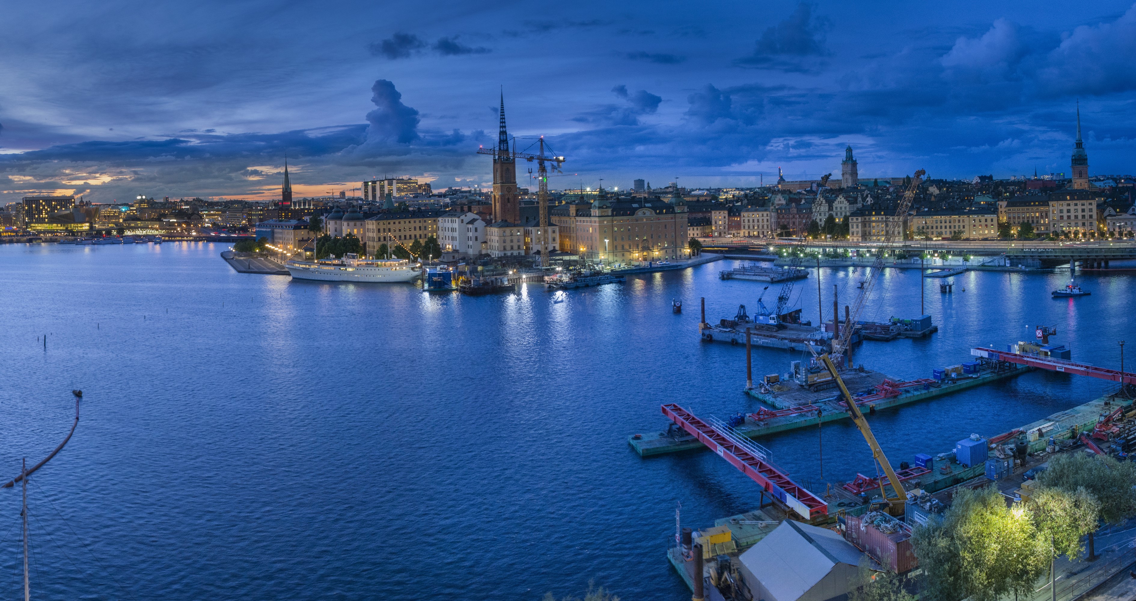Stockholm cityscape with harbor at dusk HD Wallpaper