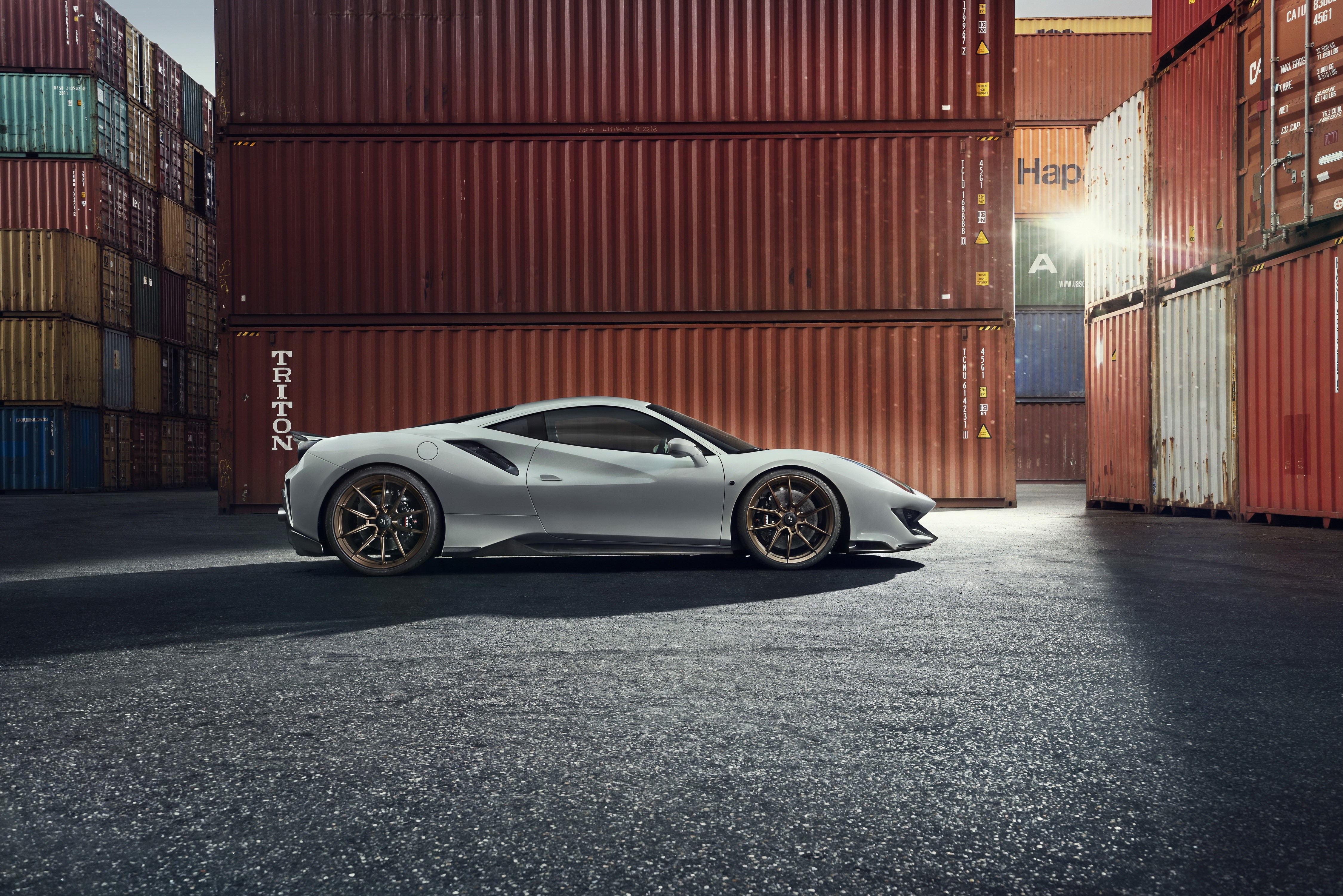 White Novitec 488 Pista Ferrari parked by shipping containers HD Wallpaper