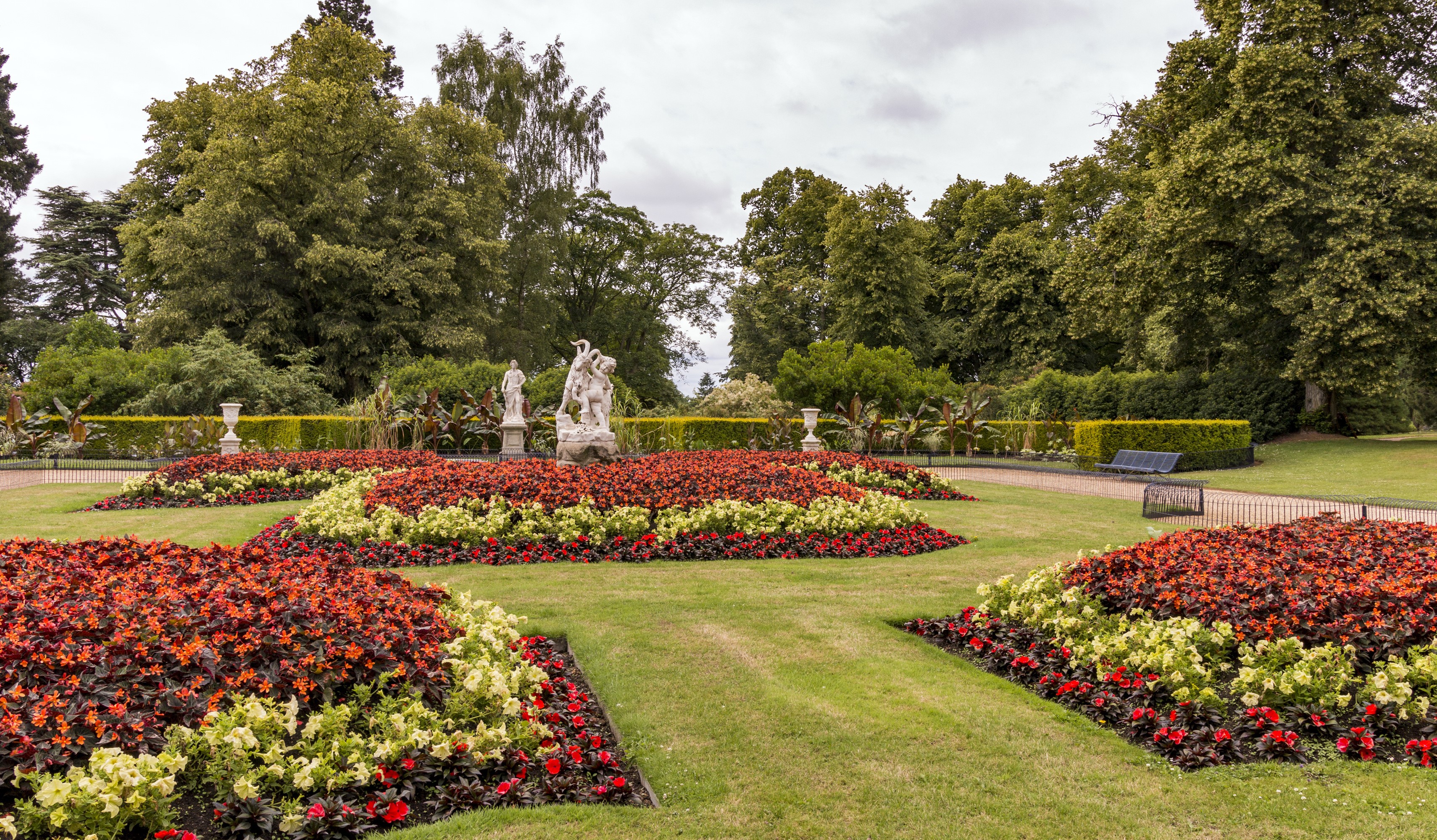 Waddesdon Manor Gardens with sculptures and flower beds HD Wallpaper
