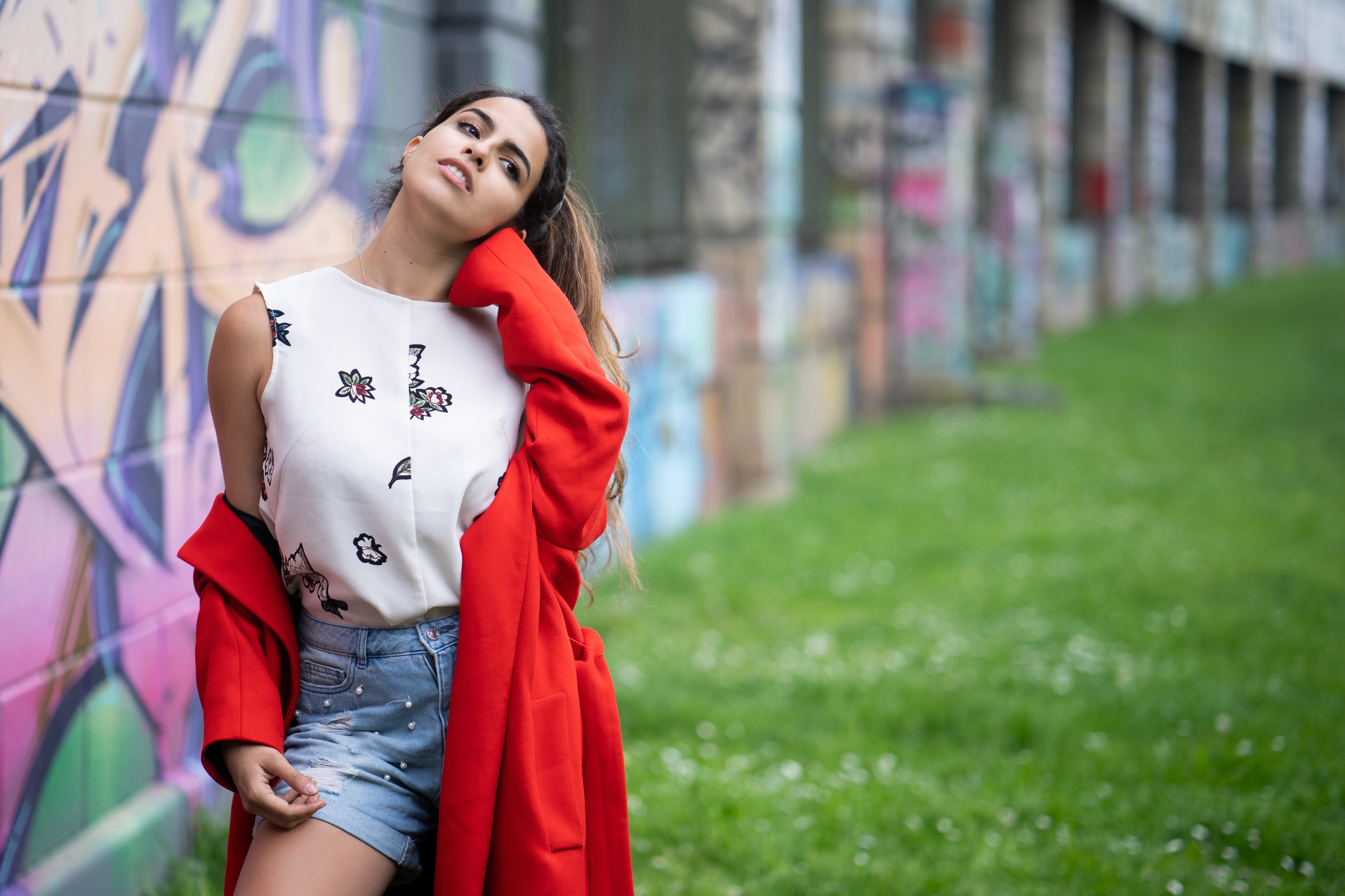 Carmen Verona posing in front of graffiti wall HD Wallpaper