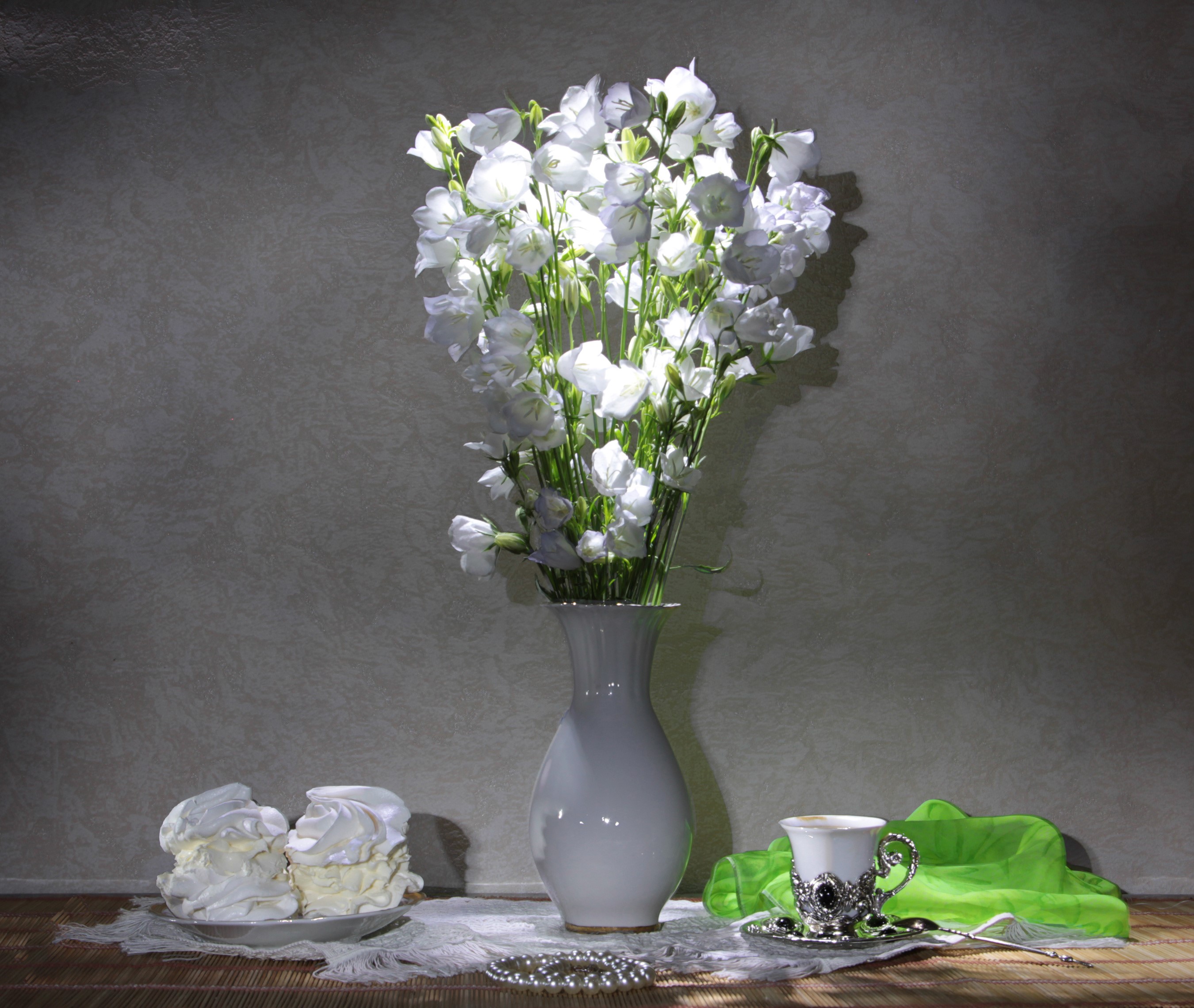 Still-life with white bellflowers, cakes, and coffee cup HD Wallpaper