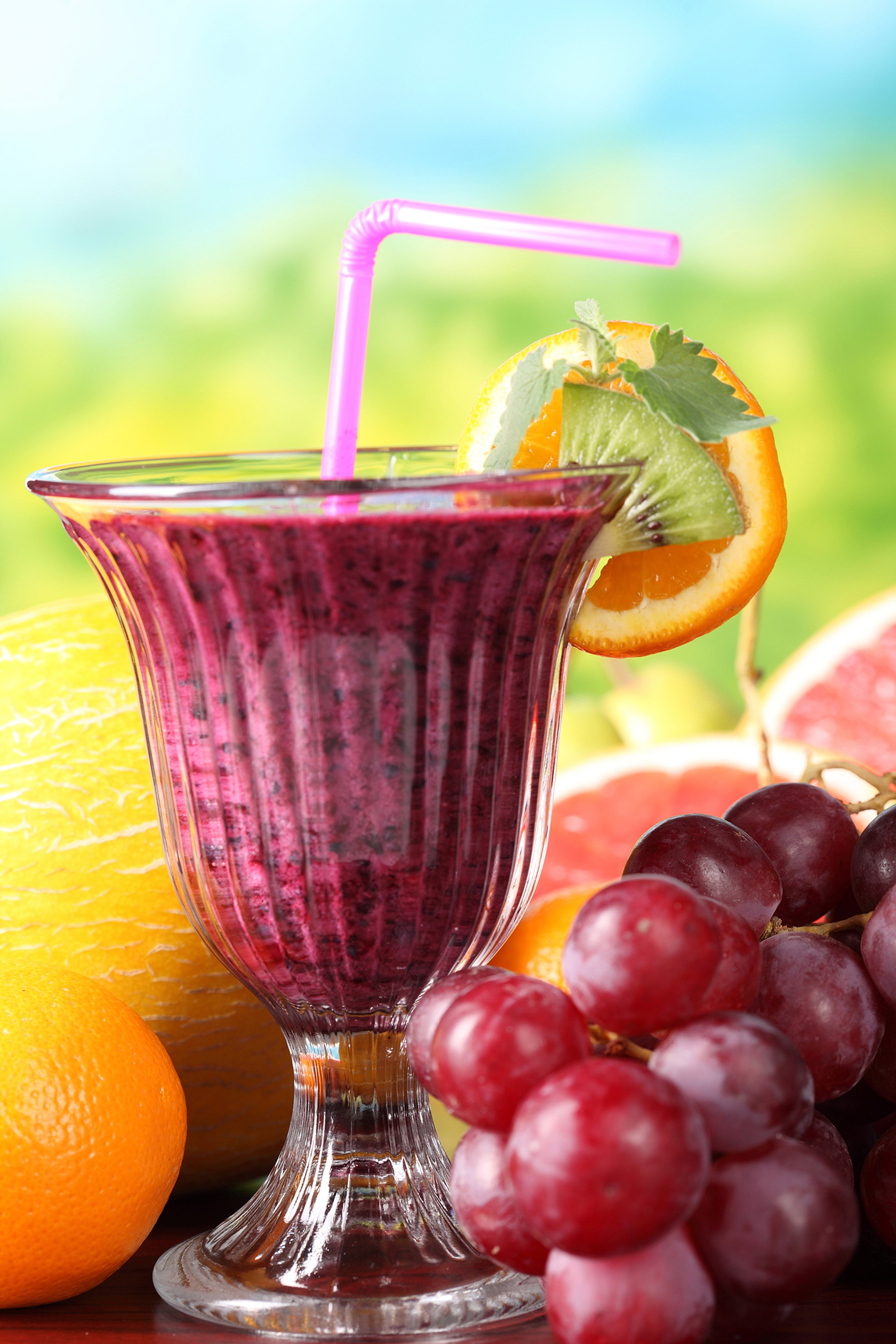 Purple smoothie with fruit garnish and grapes HD Phone Wallpaper
