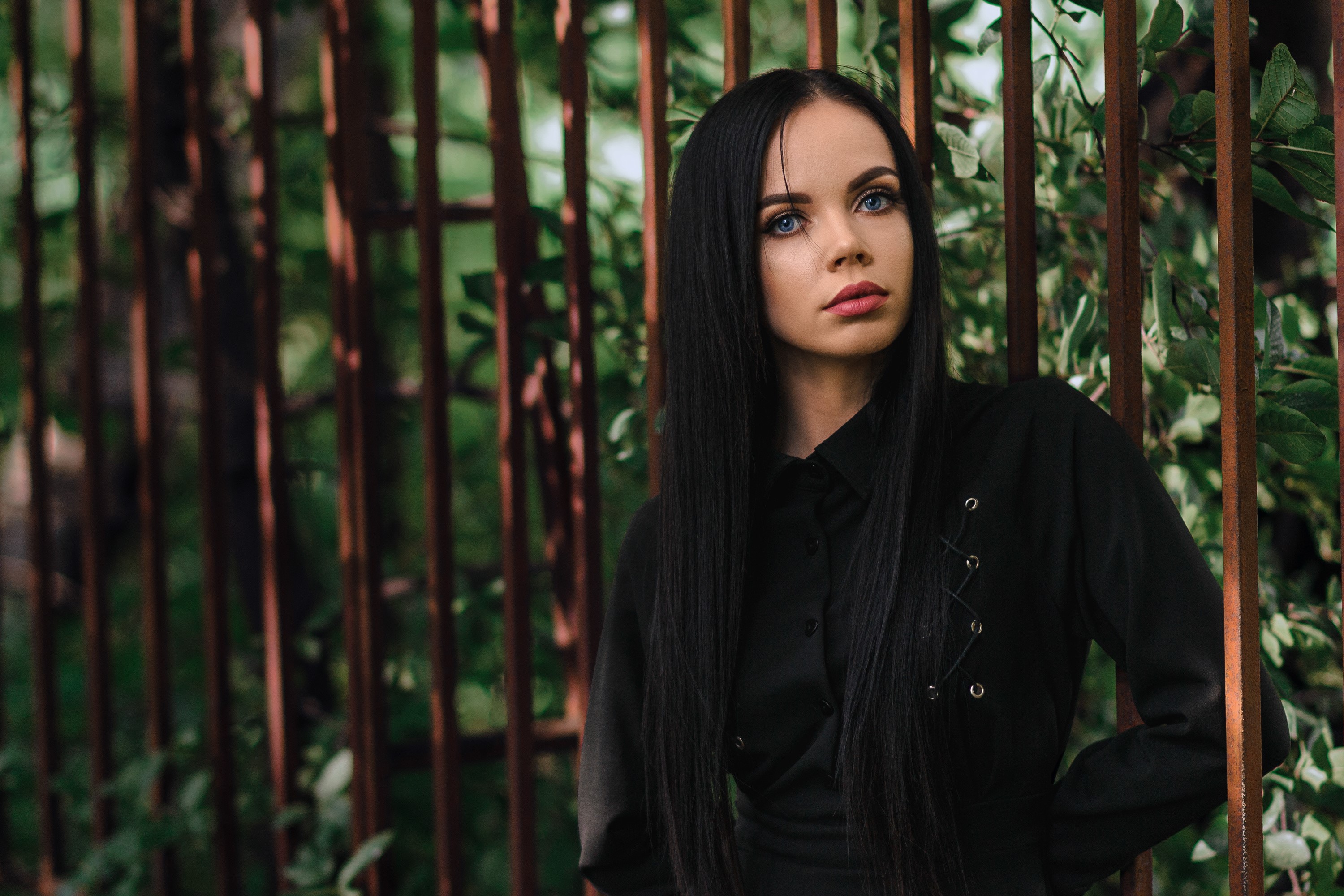 Brunette girl with blue eyes in a black shirt HD Wallpaper