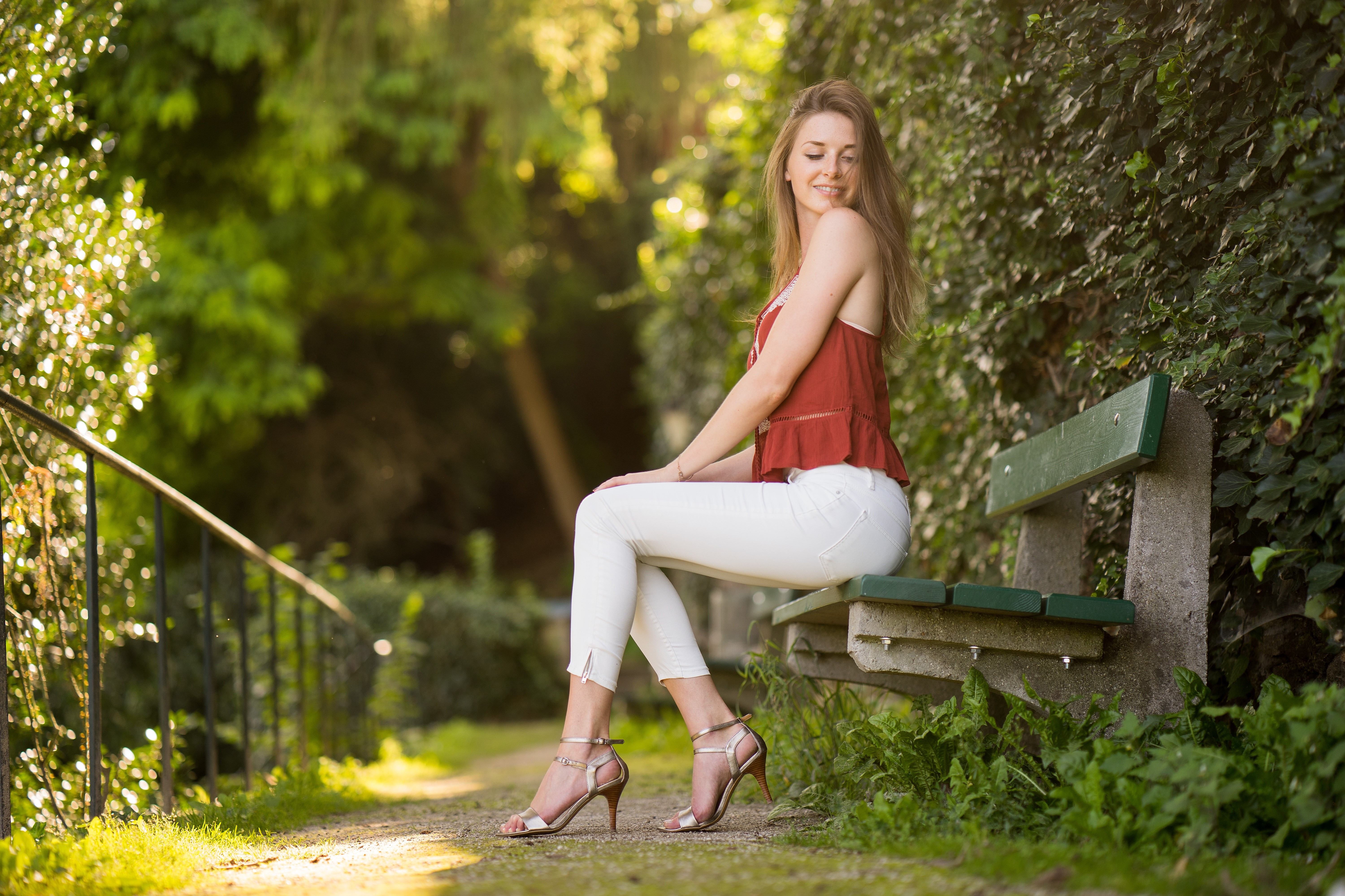 Madlen Sitting on a Park Bench in 4K HD Wallpaper