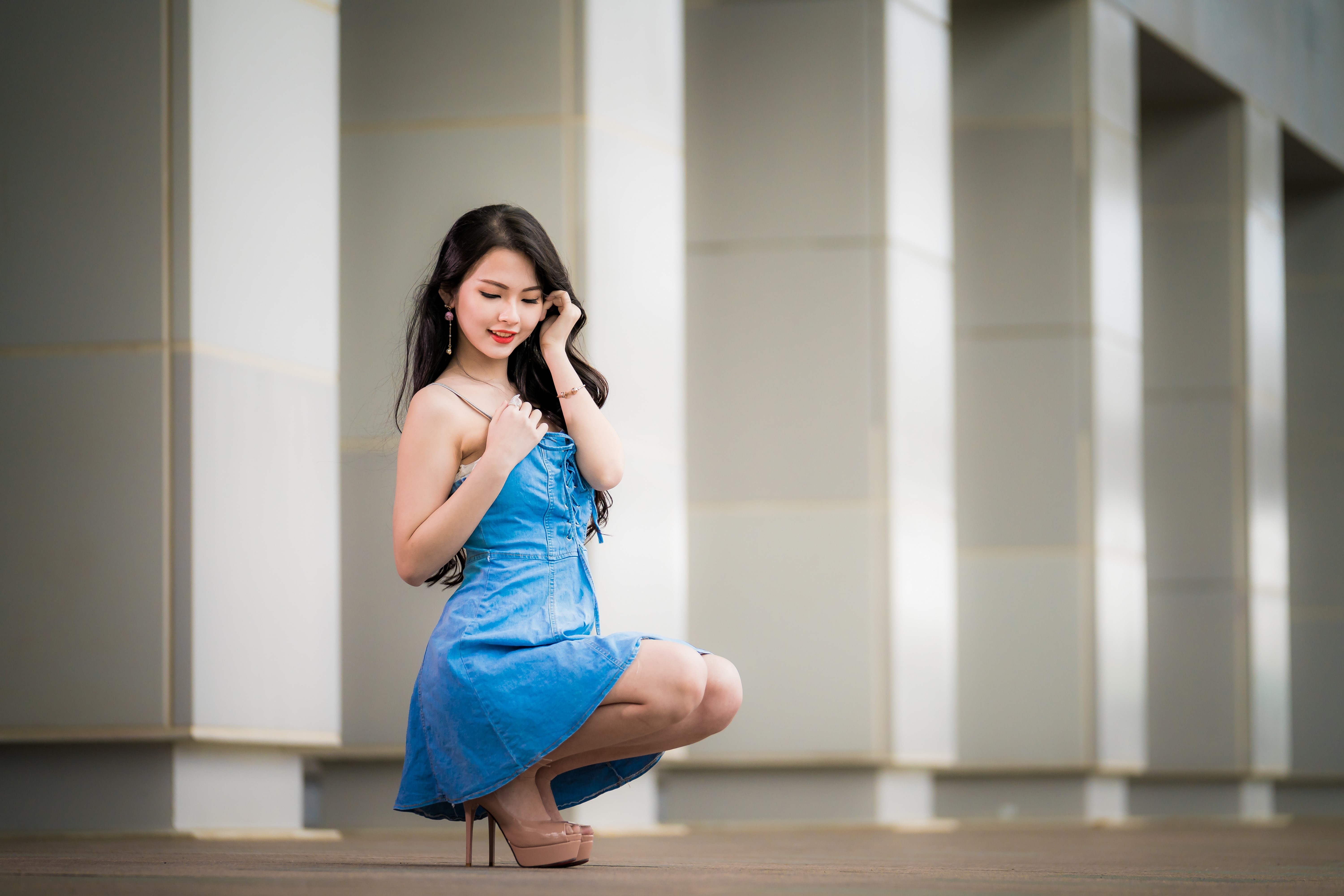 Young Woman in Blue Dress Posing Outdoors HD Wallpaper