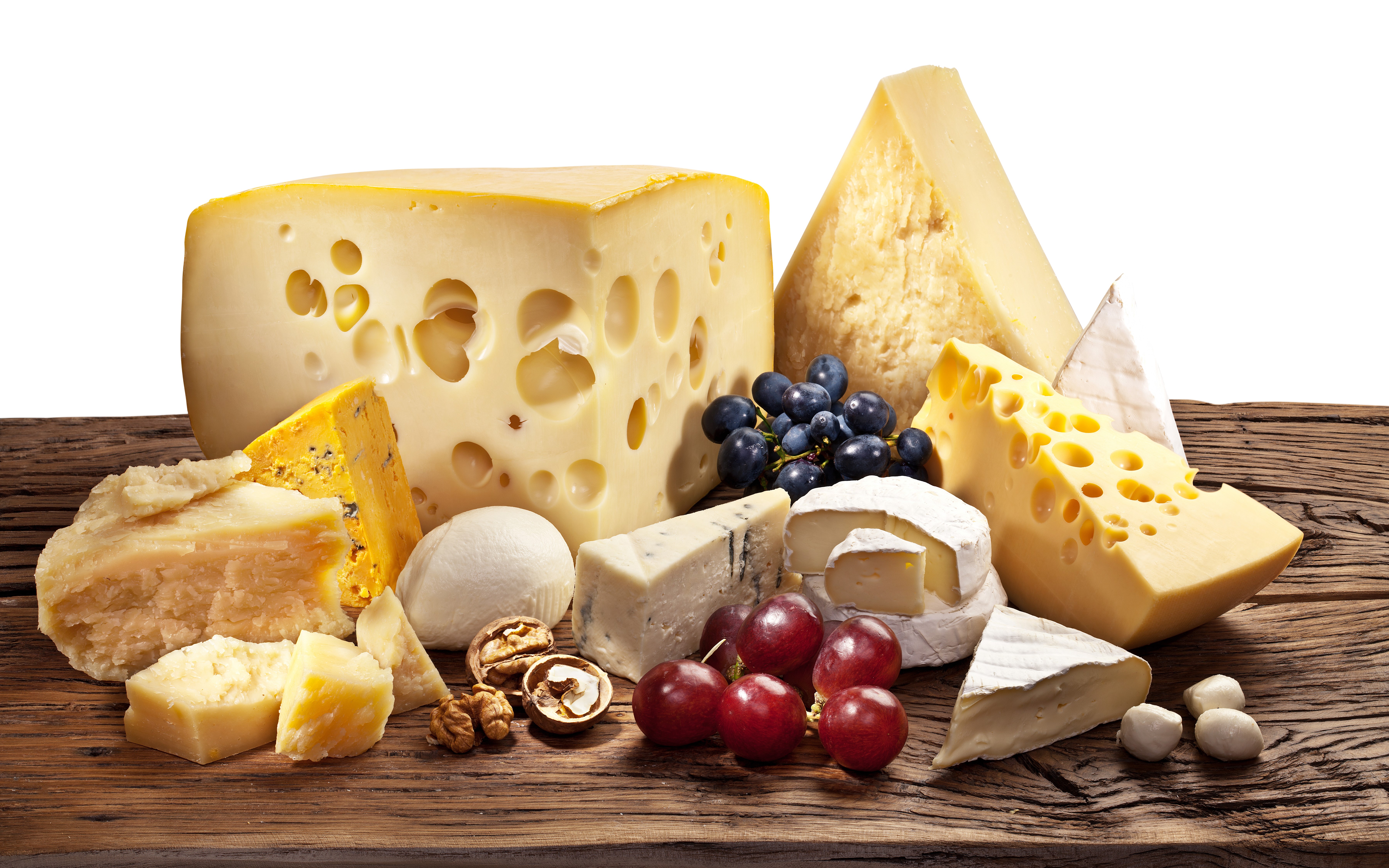 Assortment of Cheeses, Grapes, and Nuts on Wood Planks HD Wallpaper