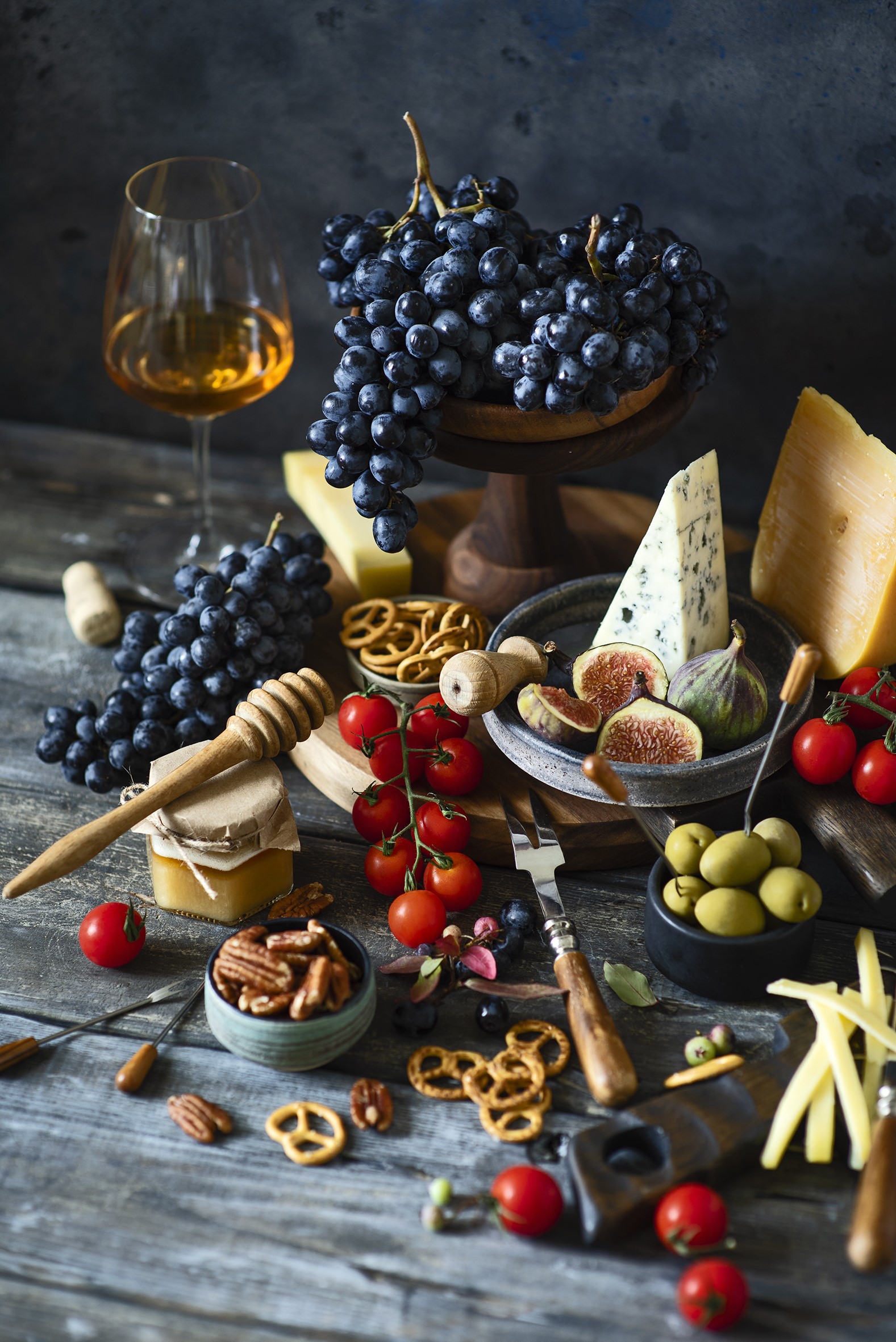 Still life of grapes, cheese, wine, and snacks HD Phone Wallpaper