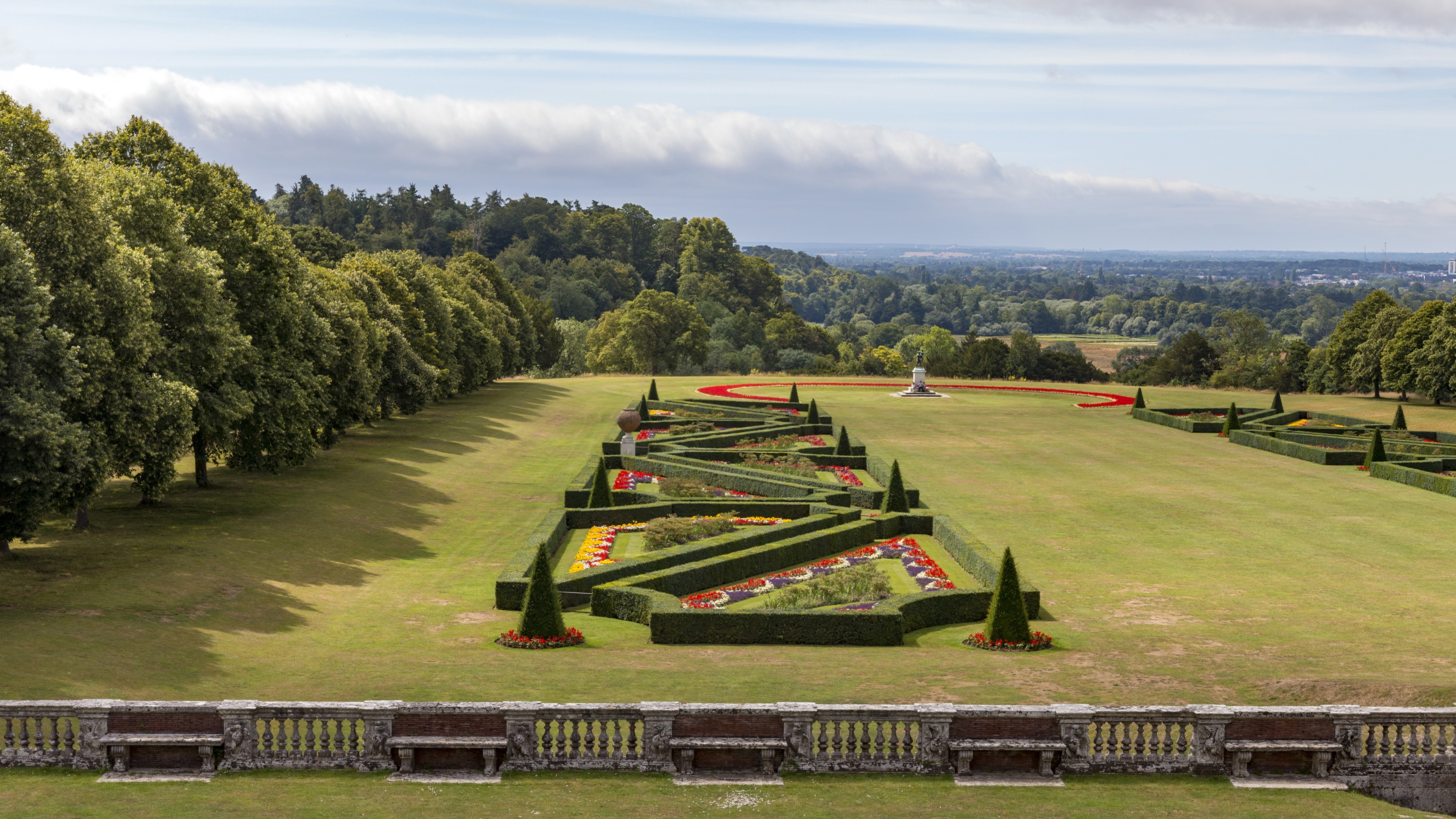 Cliveden Garden with formal flower beds and trees HD Wallpaper