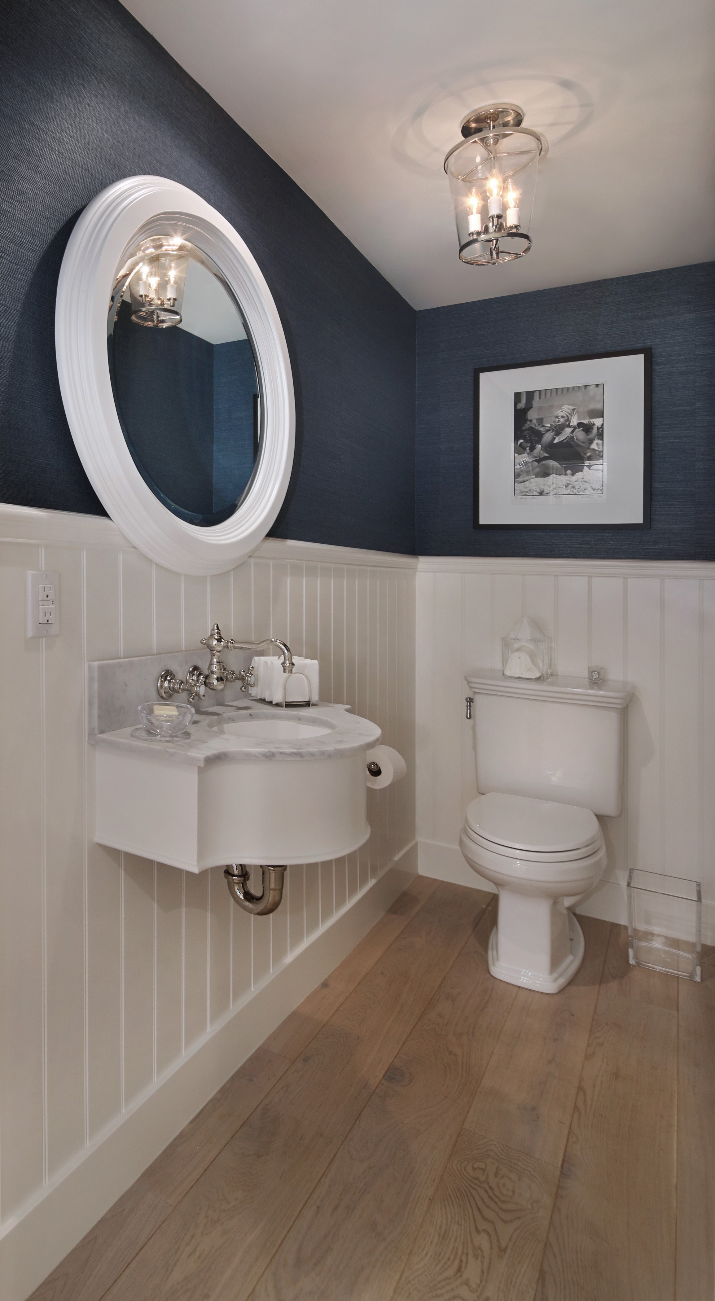 Bathroom with dark blue wallpaper and white wainscoting HD Phone Wallpaper