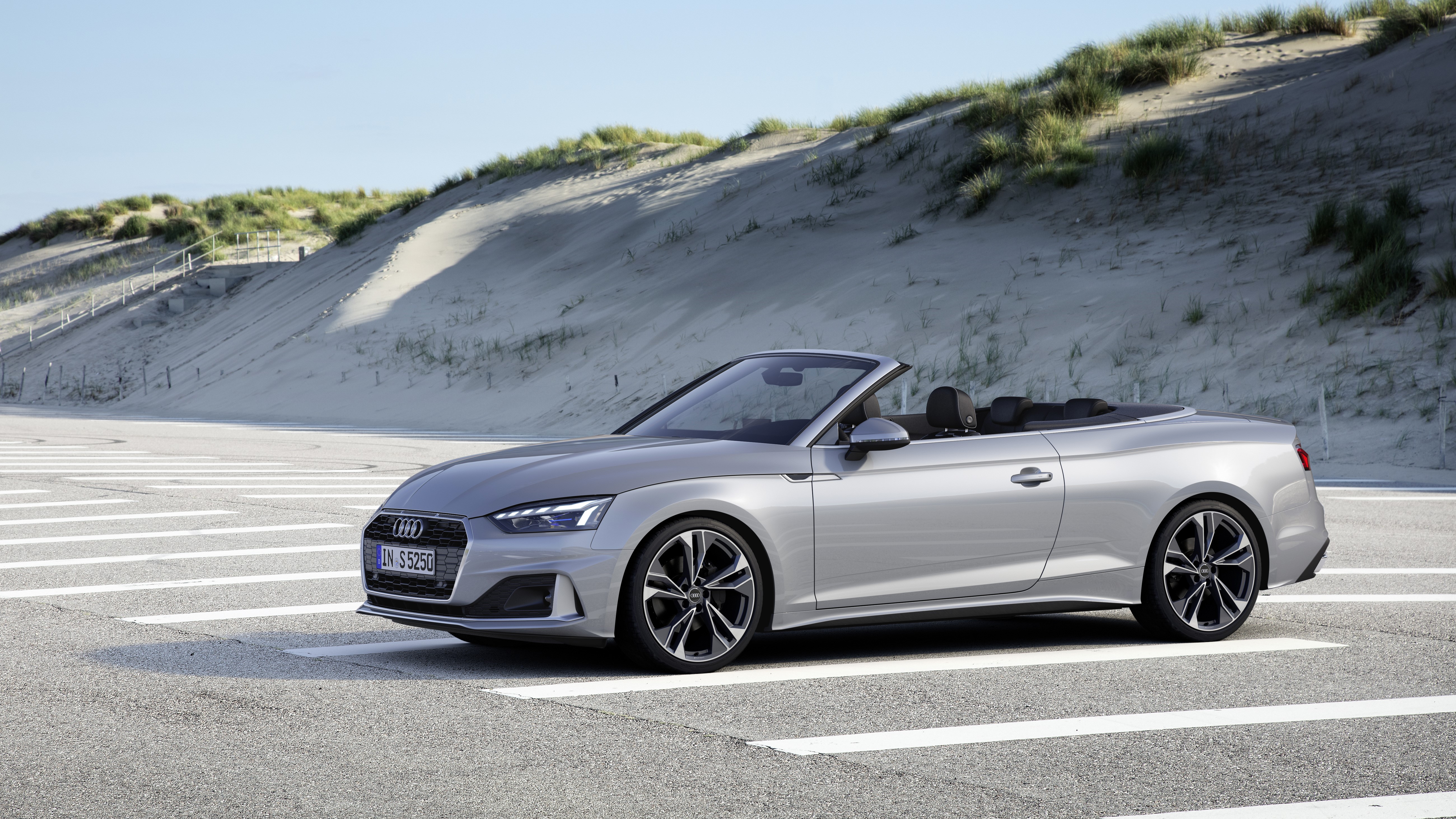 Silver Audi A5 Cabriolet parked on road HD Wallpaper