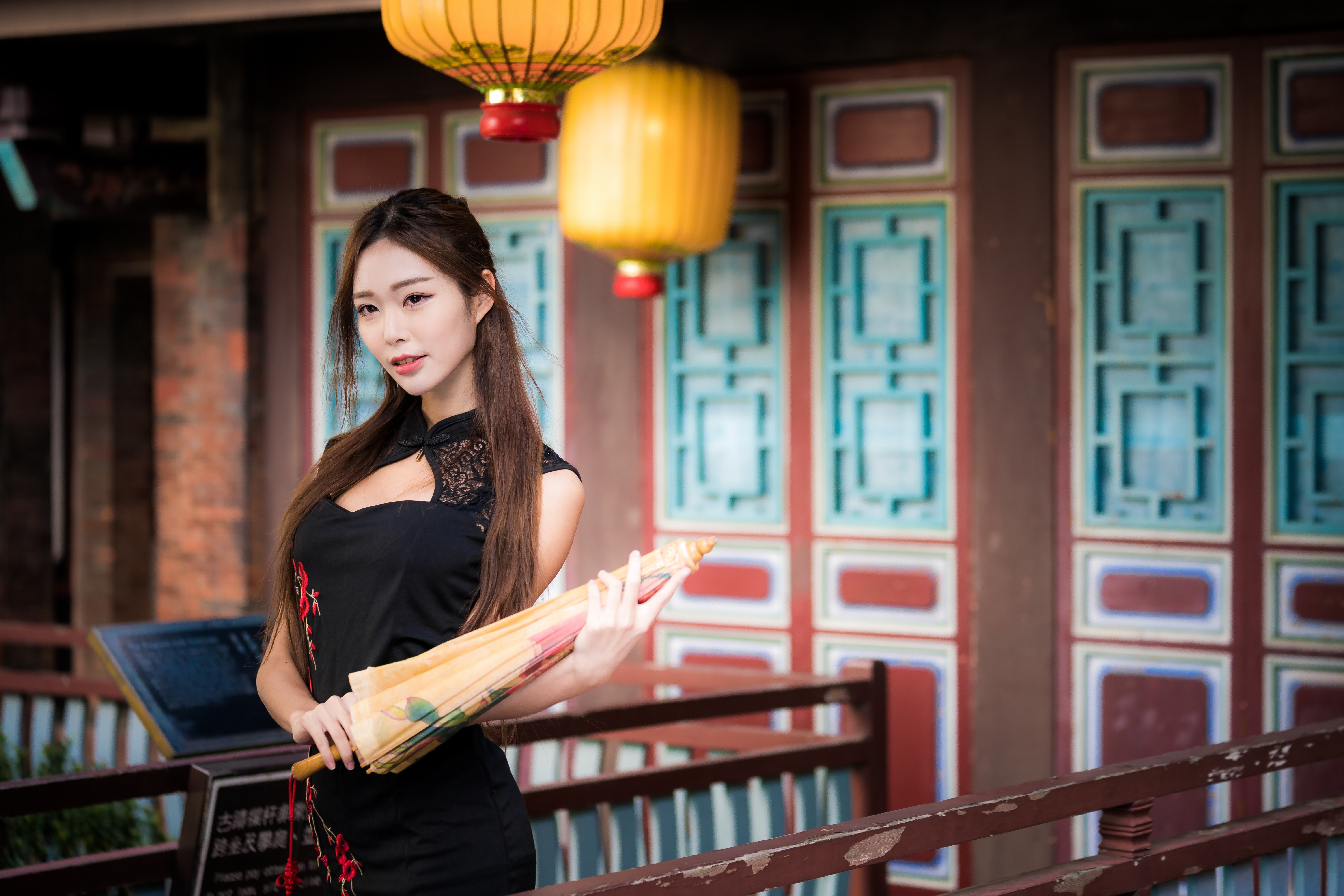 Asian woman in black dress holding umbrella HD Wallpaper