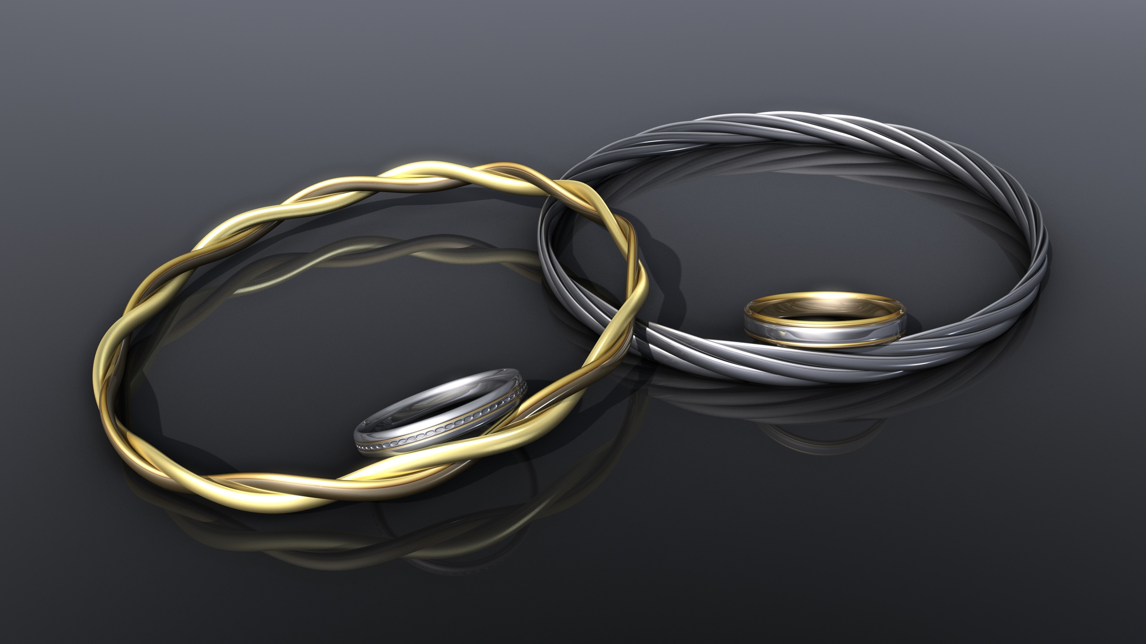 Gold and silver twisted bracelets with rings HD Wallpaper