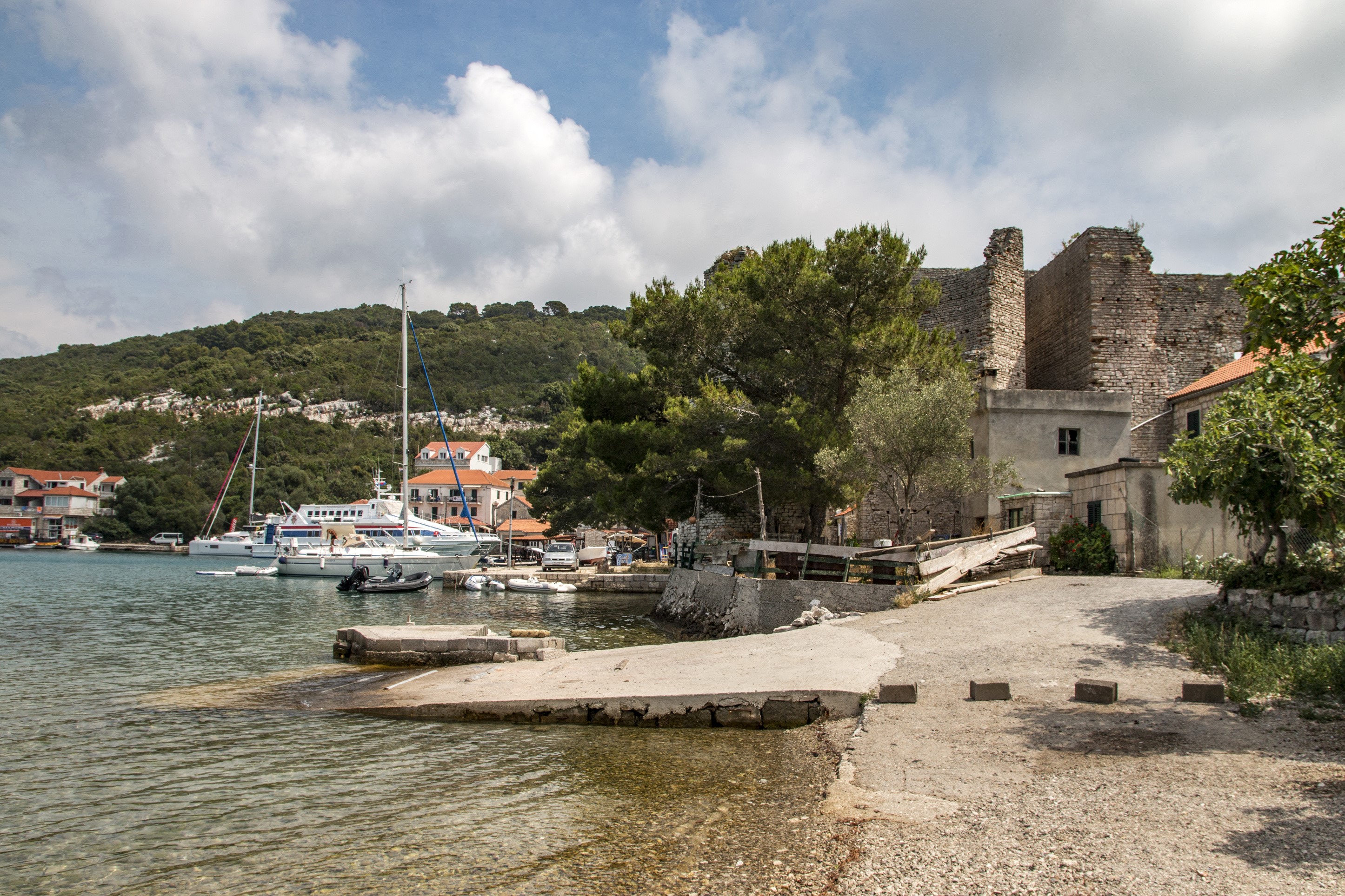 Mljet Island Croatia harbor with boats and old stone ruins HD Wallpaper