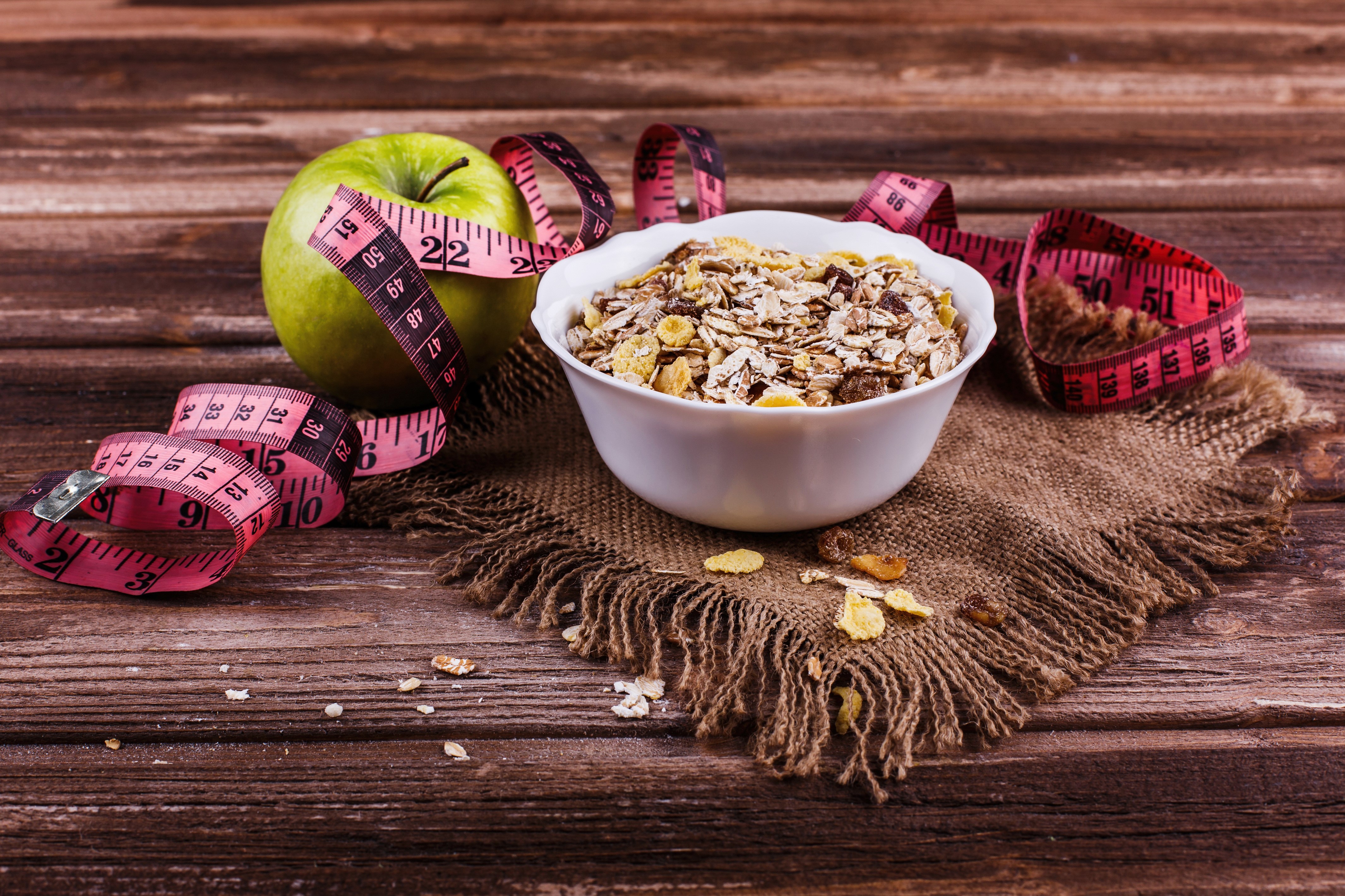 4K Muesli, Apple, and Tape Measure on Wood HD Wallpaper