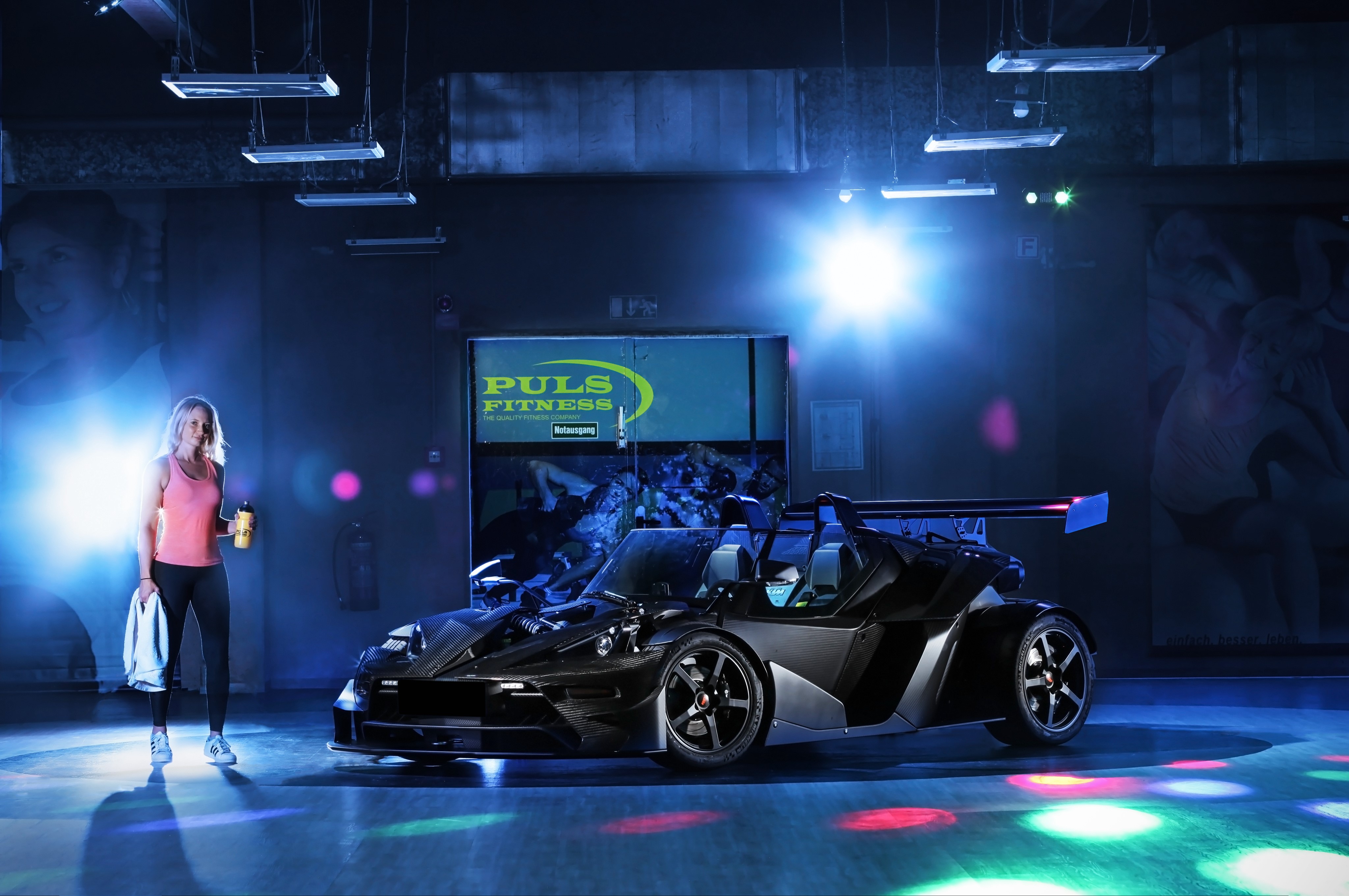 Woman and KTM X-Bow Carbon DSG in gym HD Wallpaper