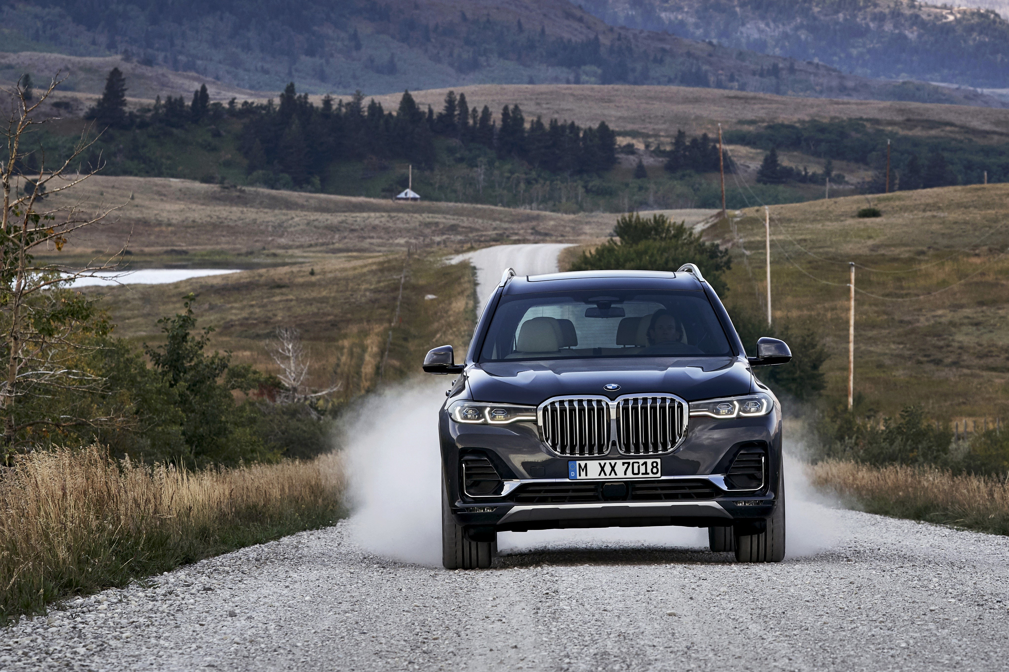 2019 BMW X7 G07 Crossover on a dirt road HD Wallpaper