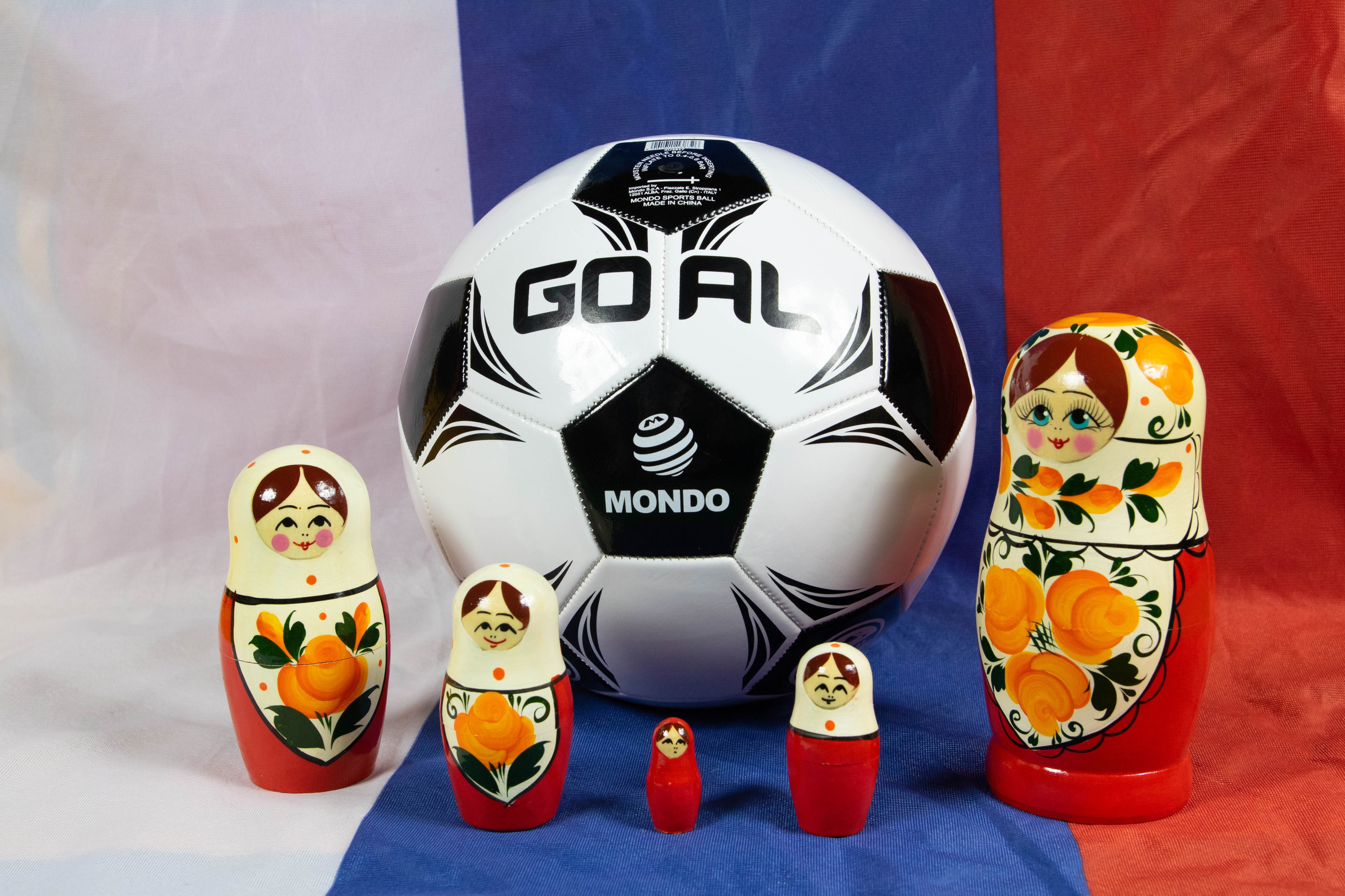 Soccer ball and Matryoshka dolls on French flag HD Wallpaper