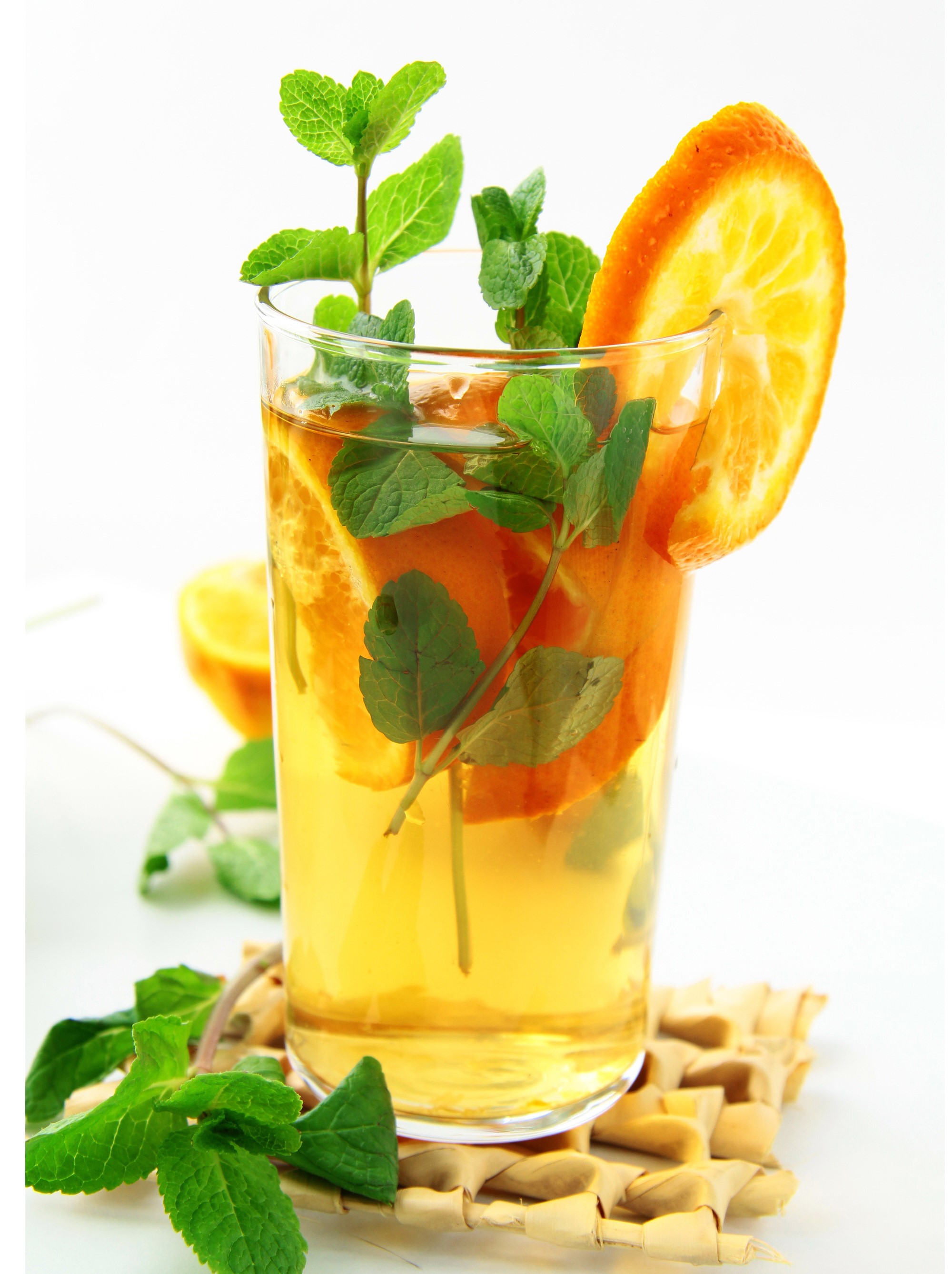 Orange and mint iced tea in a highball glass HD Phone Wallpaper