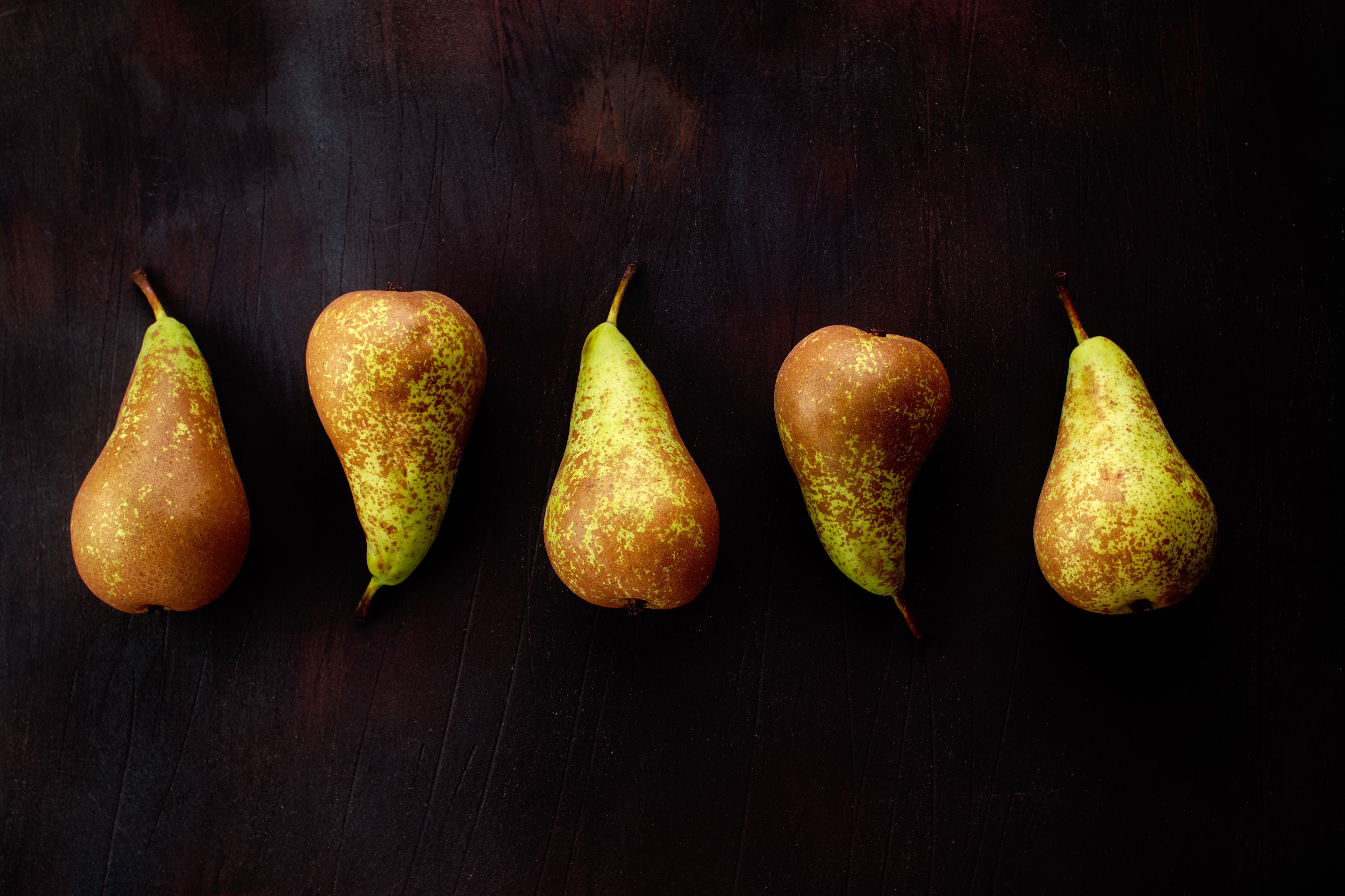 Five Pears on a Black Background HD Wallpaper