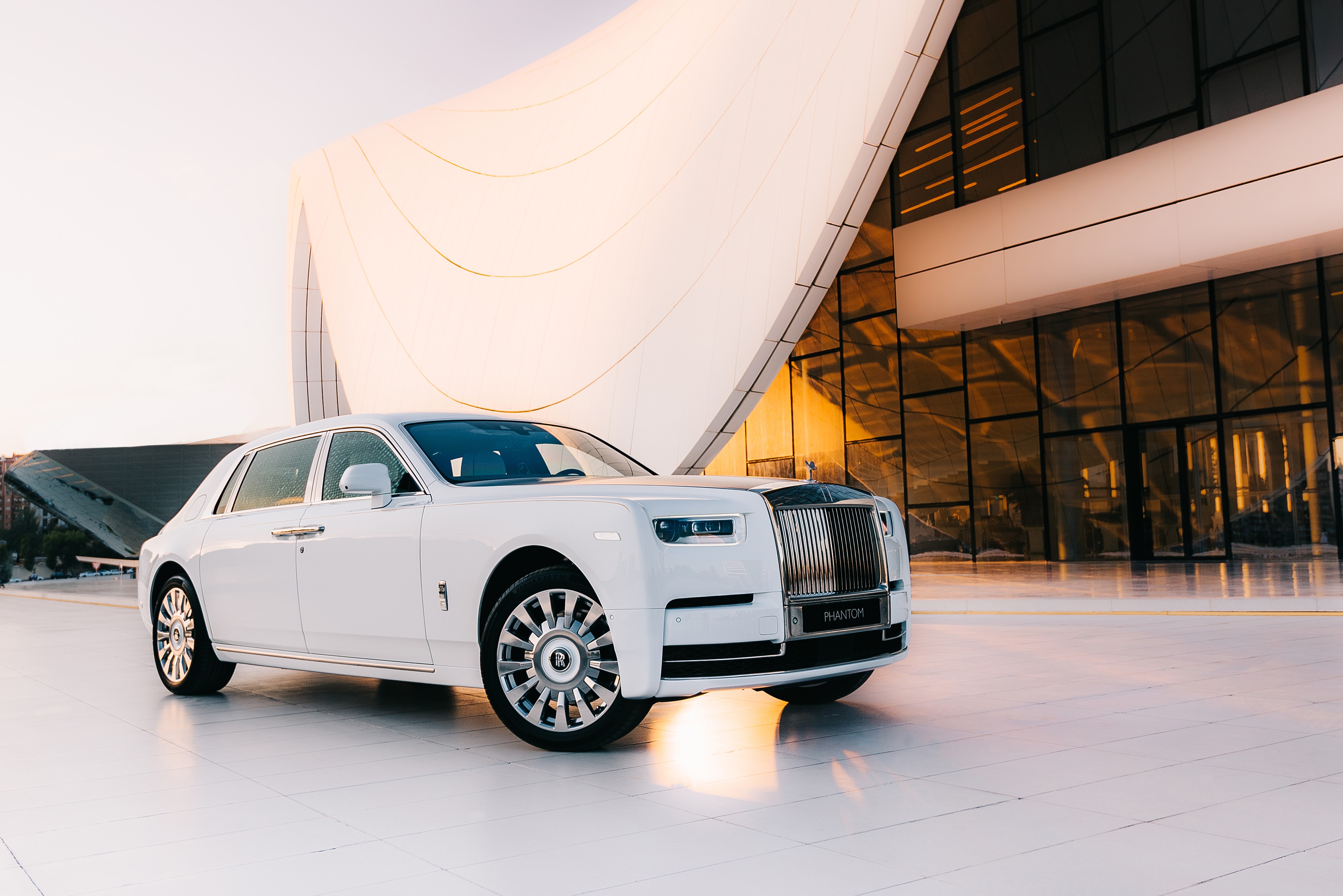 White Rolls-Royce Phantom Tranquillity parked outside modern building HD Wallpaper