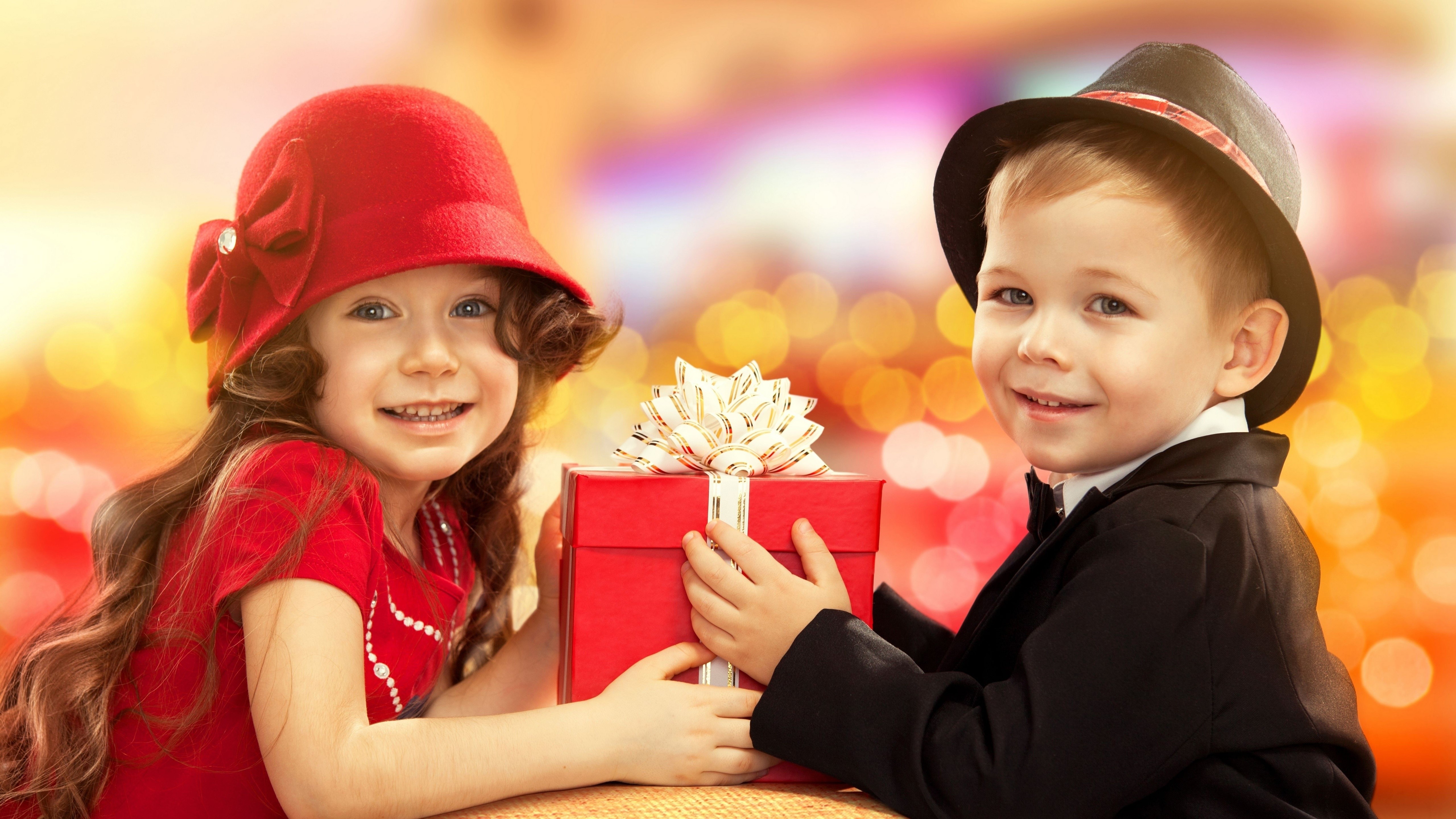 Two Children with a Gift HD Wallpaper