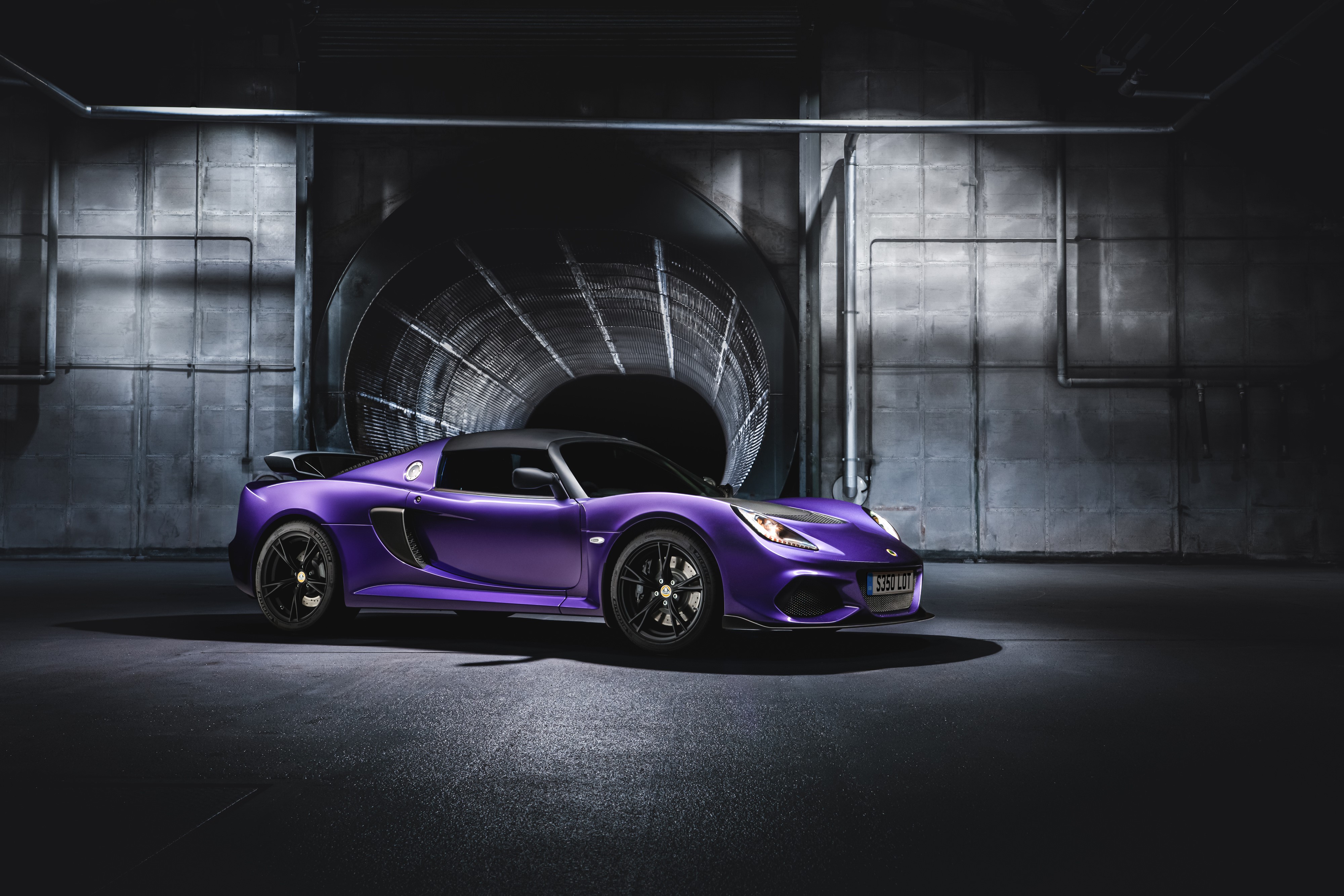 Violet Lotus Exige Sport 350 in industrial setting HD Wallpaper