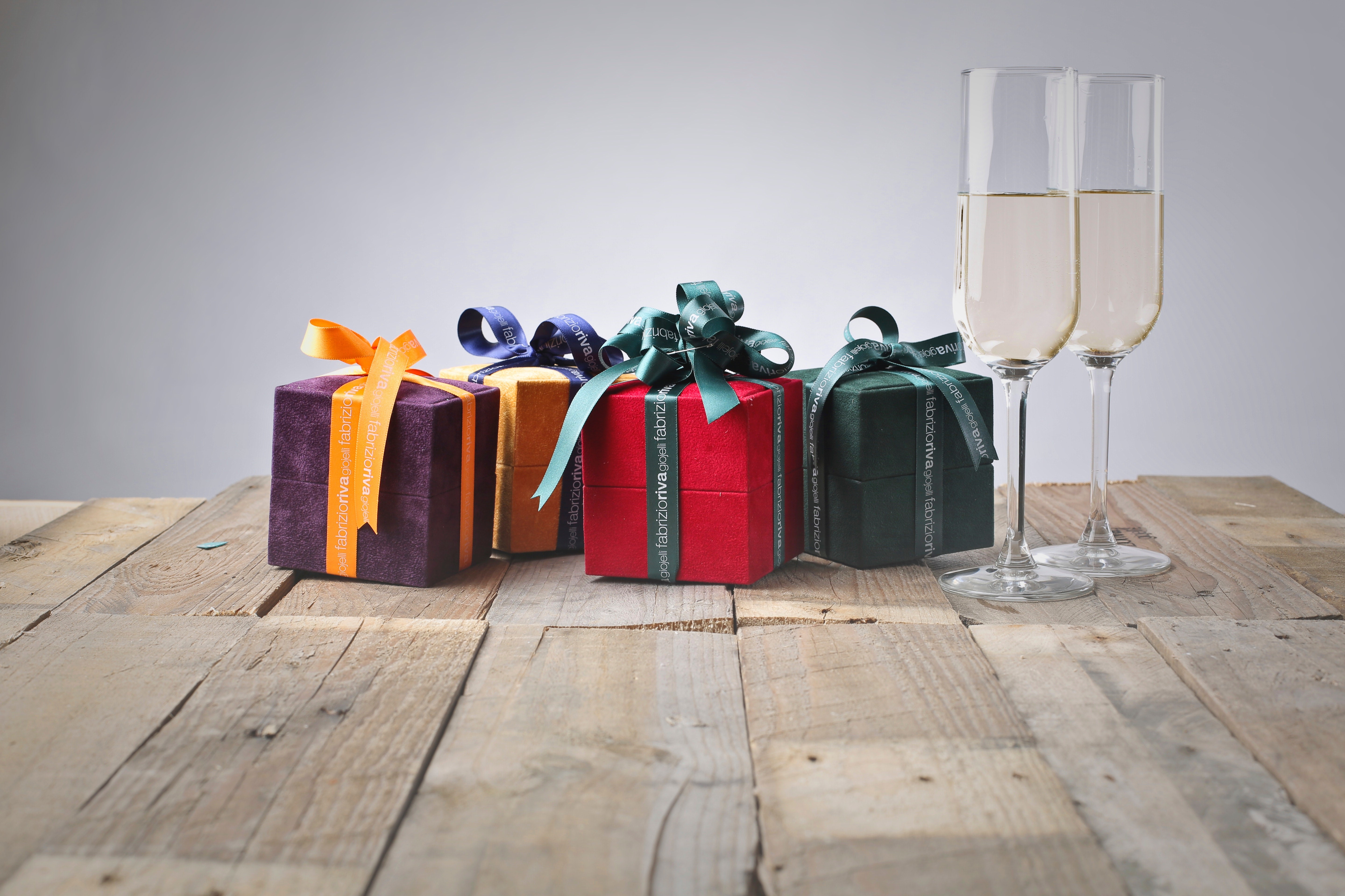 Gifts and Champagne Glasses on Wood Planks HD Wallpaper