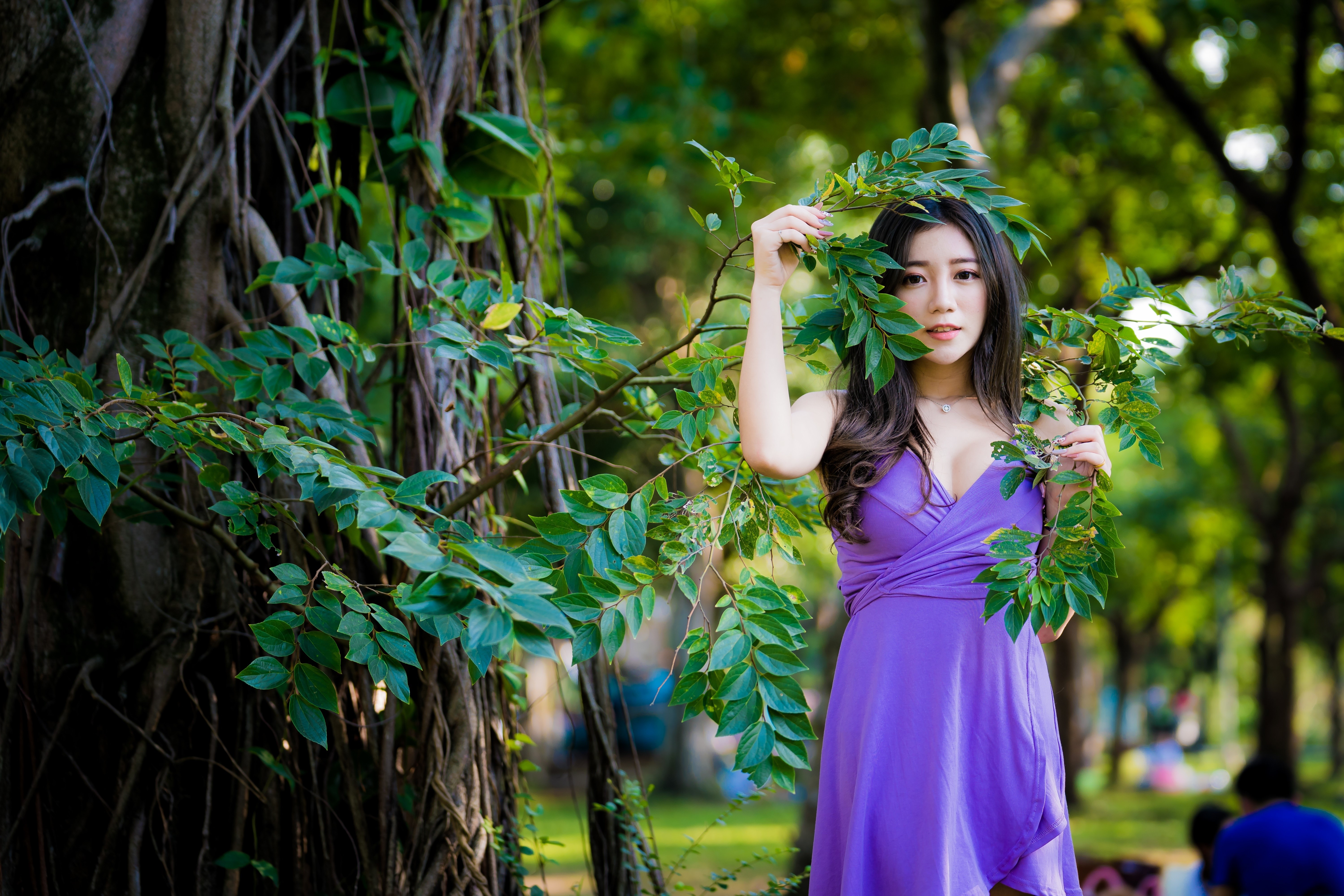 4K Portrait of Woman in Purple Dress with Branches HD Wallpaper