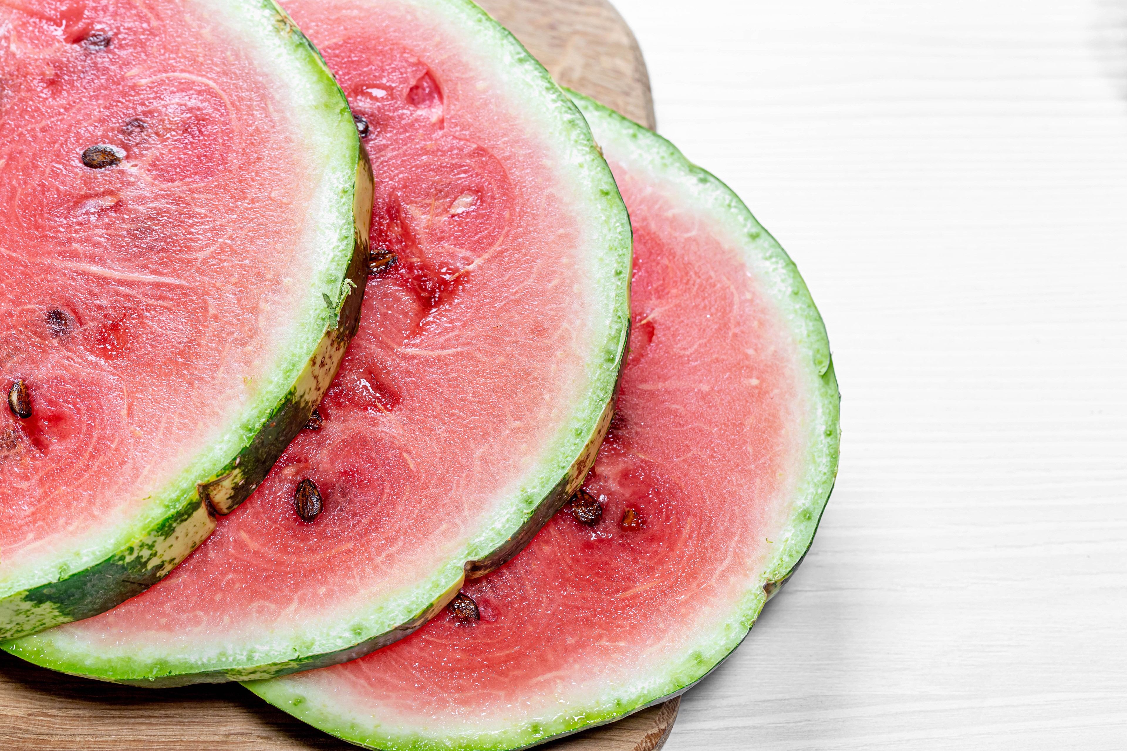 Slices of Watermelon on a Cutting Board HD Wallpaper